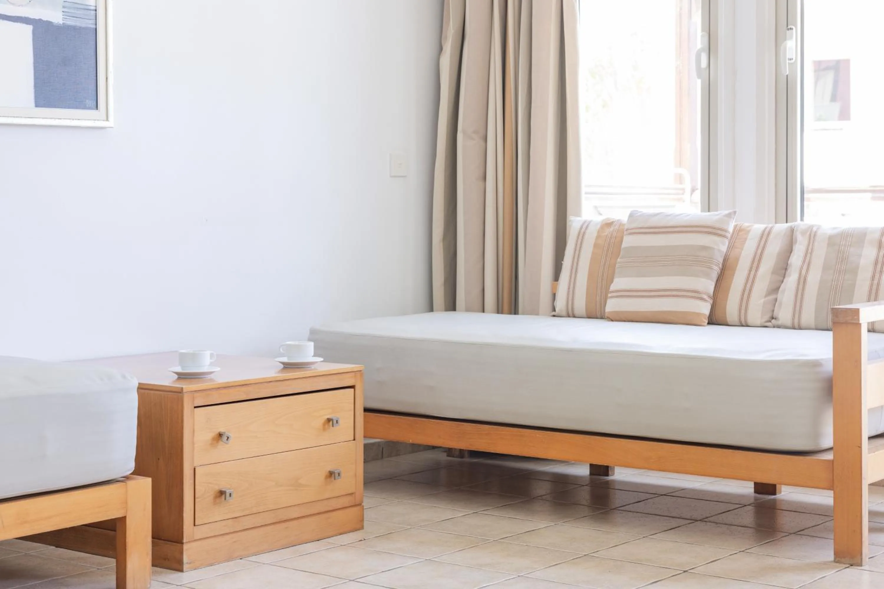 Bed in Louis Althea Beach