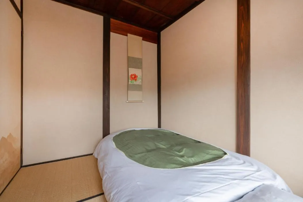 Bed in お宿梅夜Guesthouse Umeya