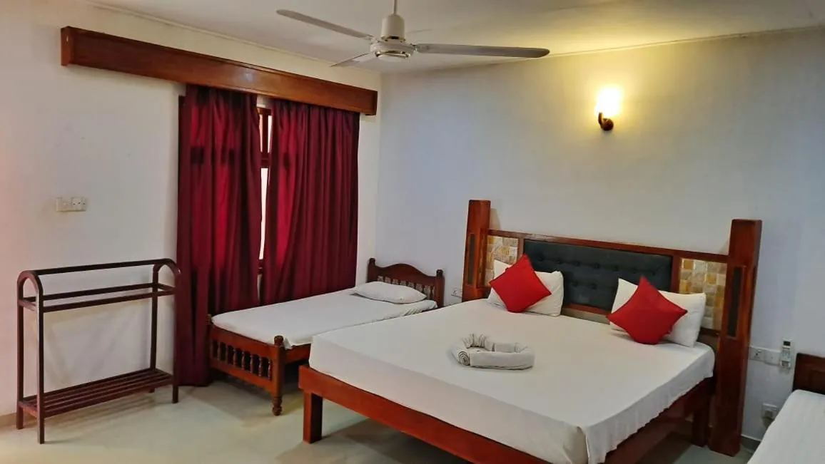 Bed in Sea View Beach Hotel