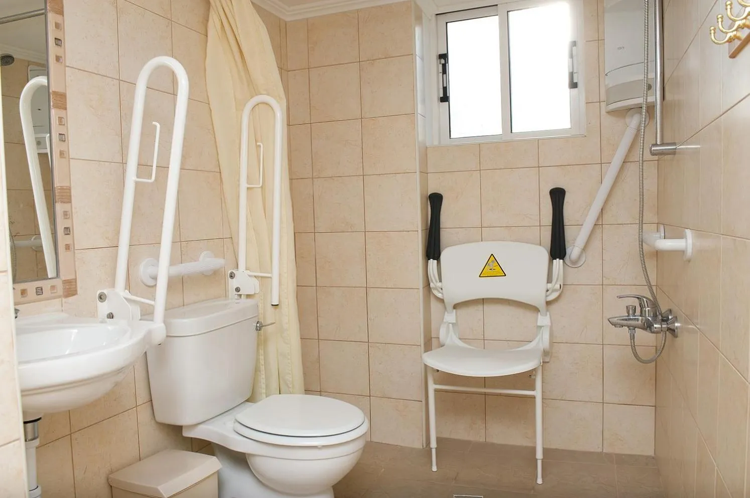 Shower in C & A Hotel Apartments