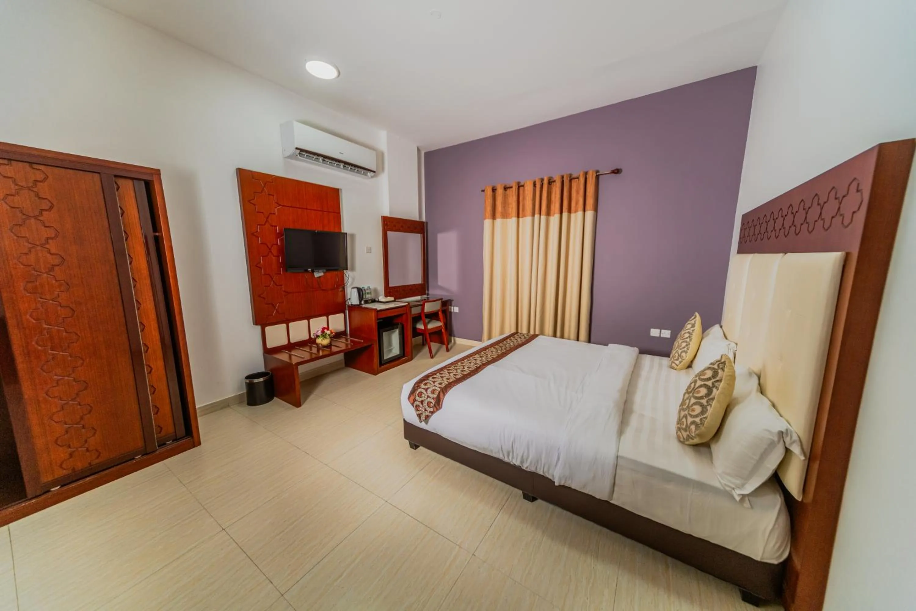 Communal lounge/ TV room in Zaki Hotel Apartment