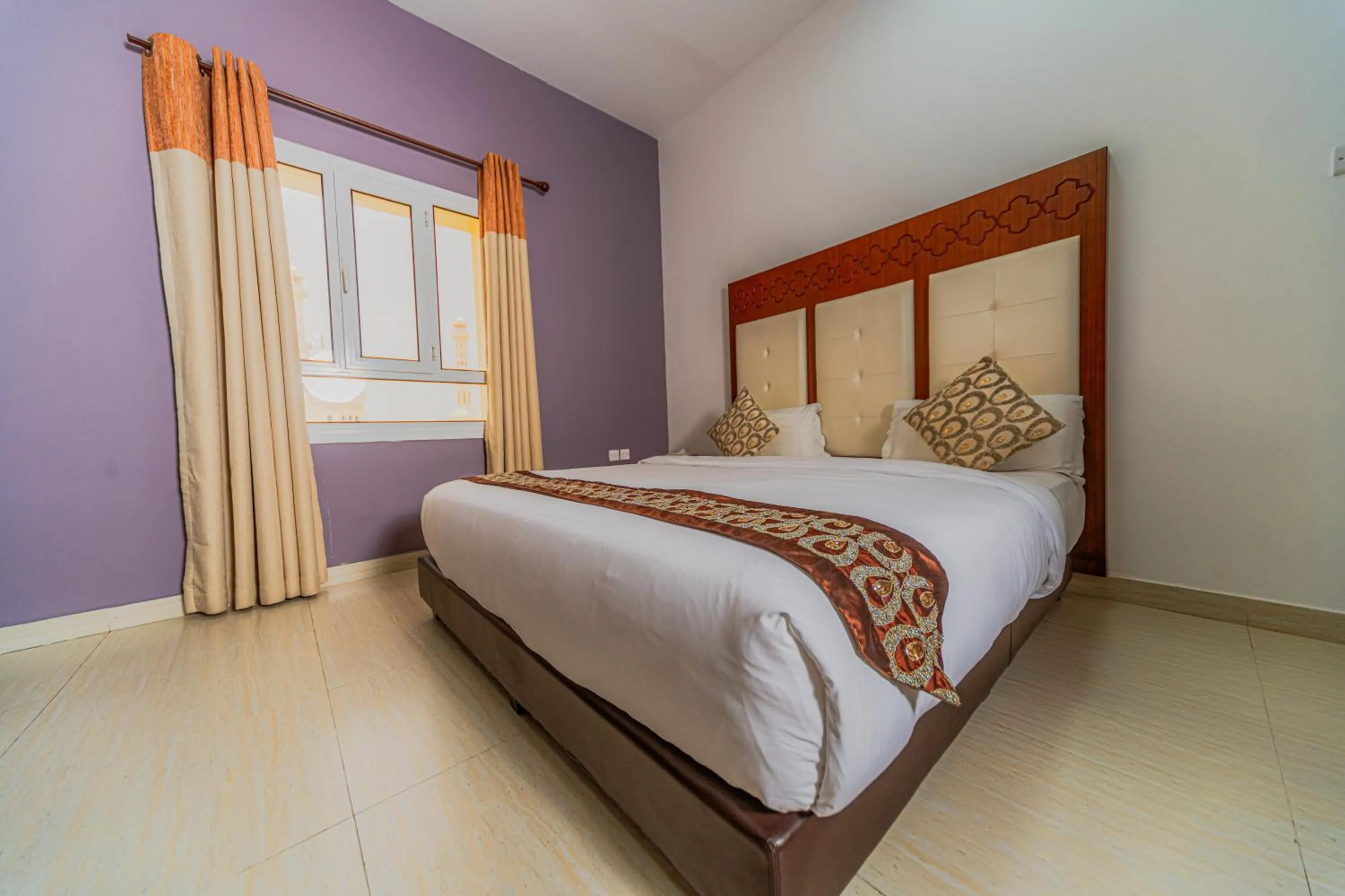 Bed in Zaki Hotel Apartment