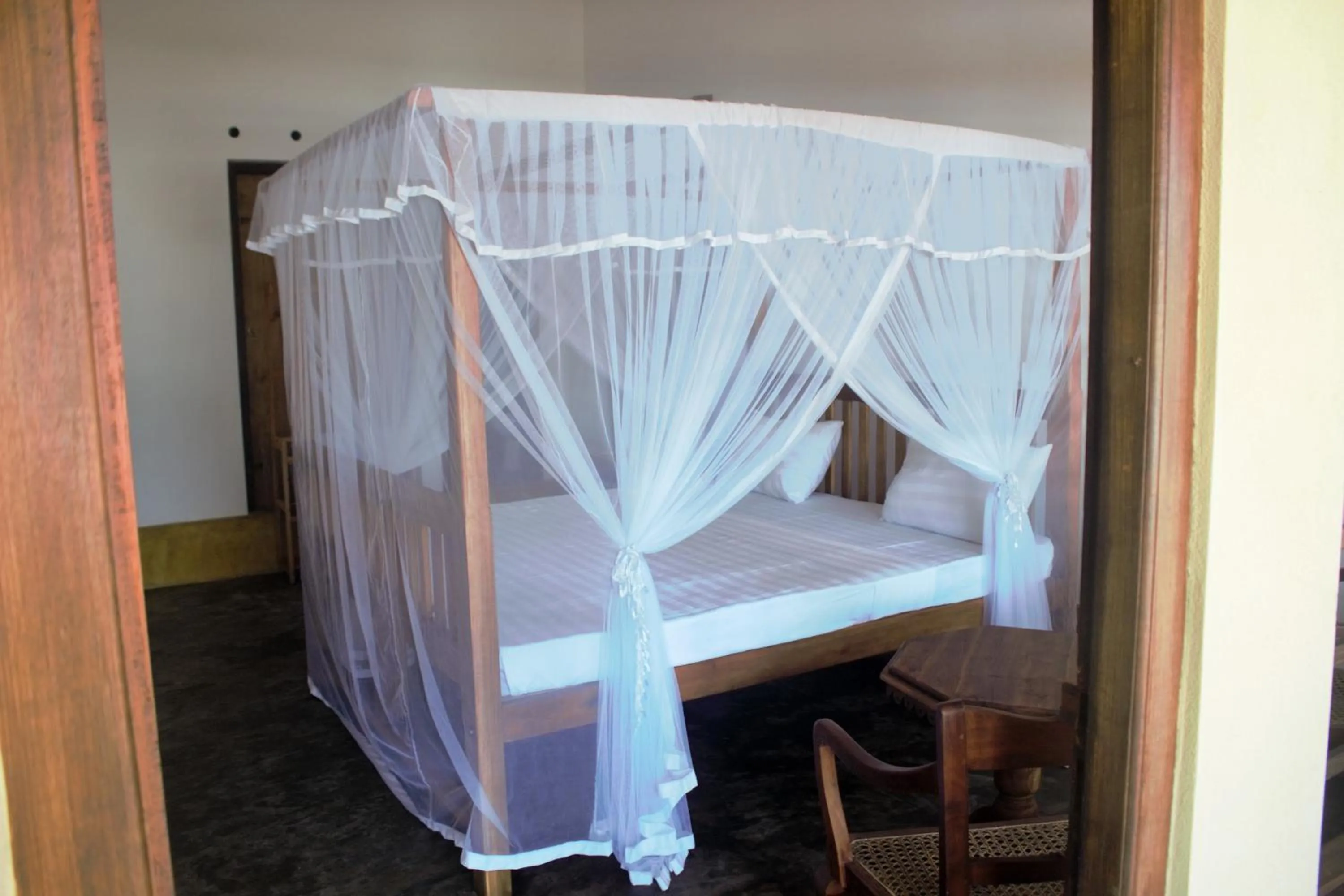 Bed in Asiri Yoga Retreat