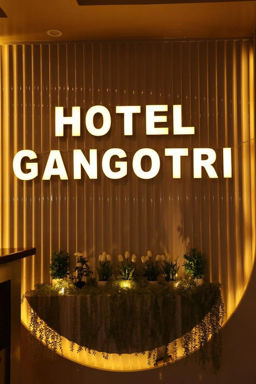 Property logo or sign in Hotel Gangotri