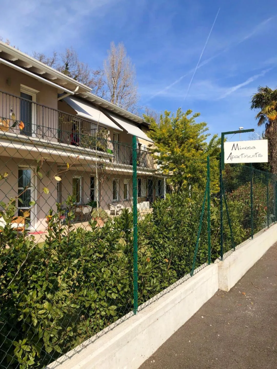 Property logo or sign in Mimosa Apartments