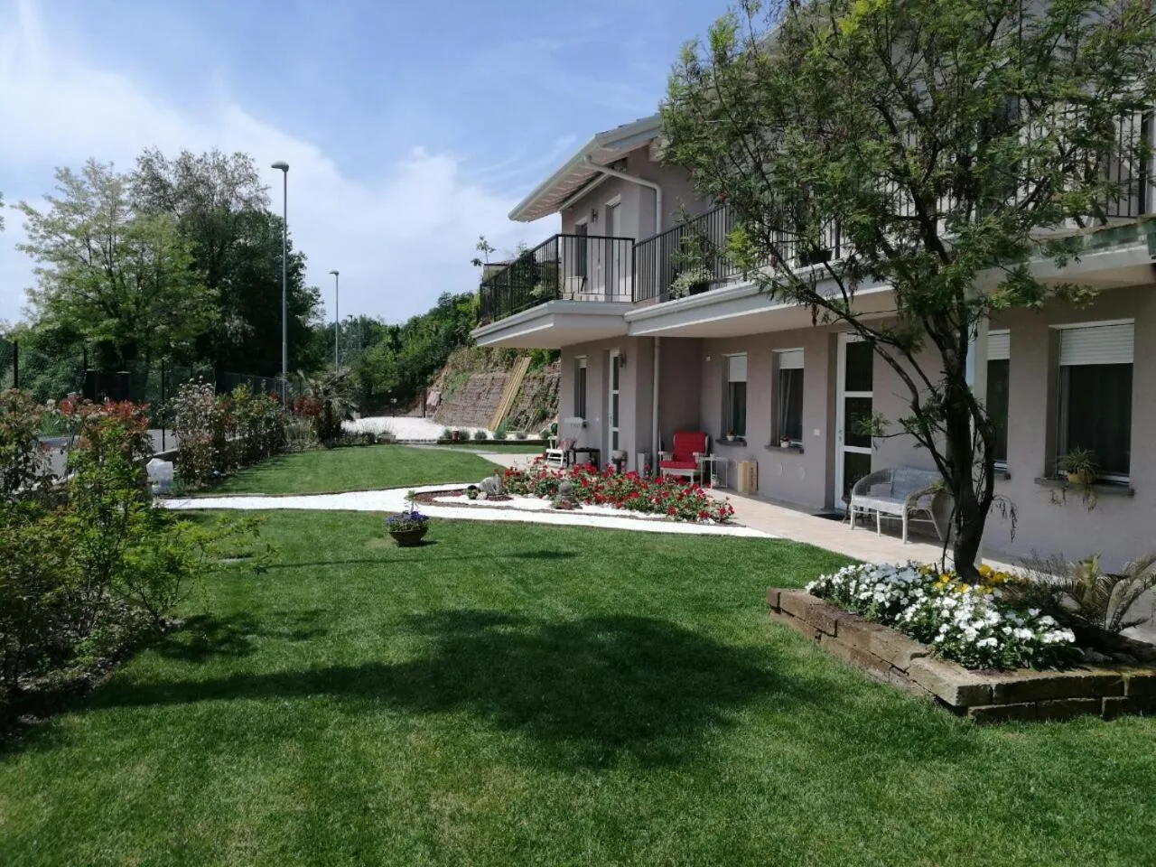 Facade/entrance in Mimosa Apartments