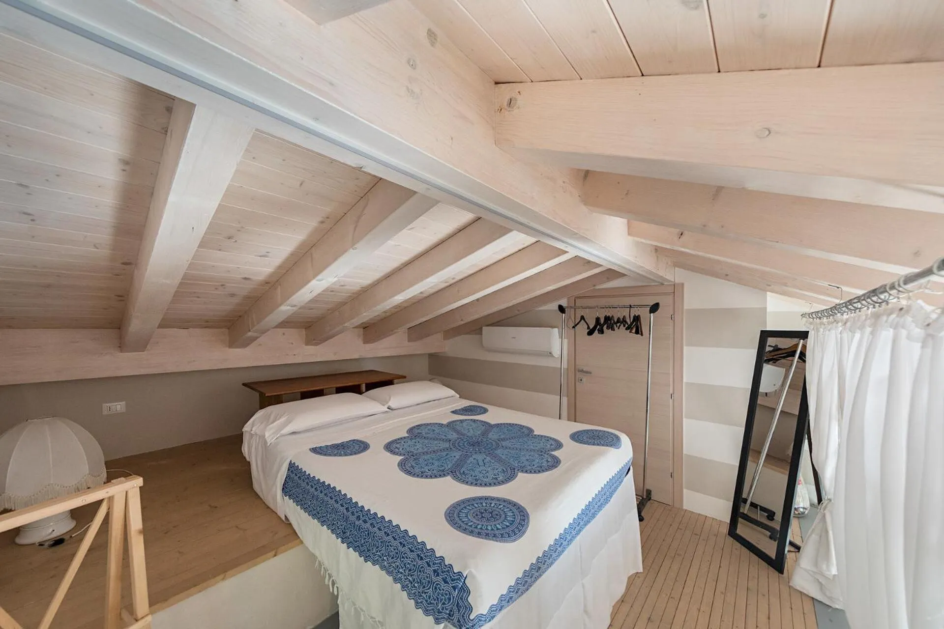 Bed in Mimosa Apartments