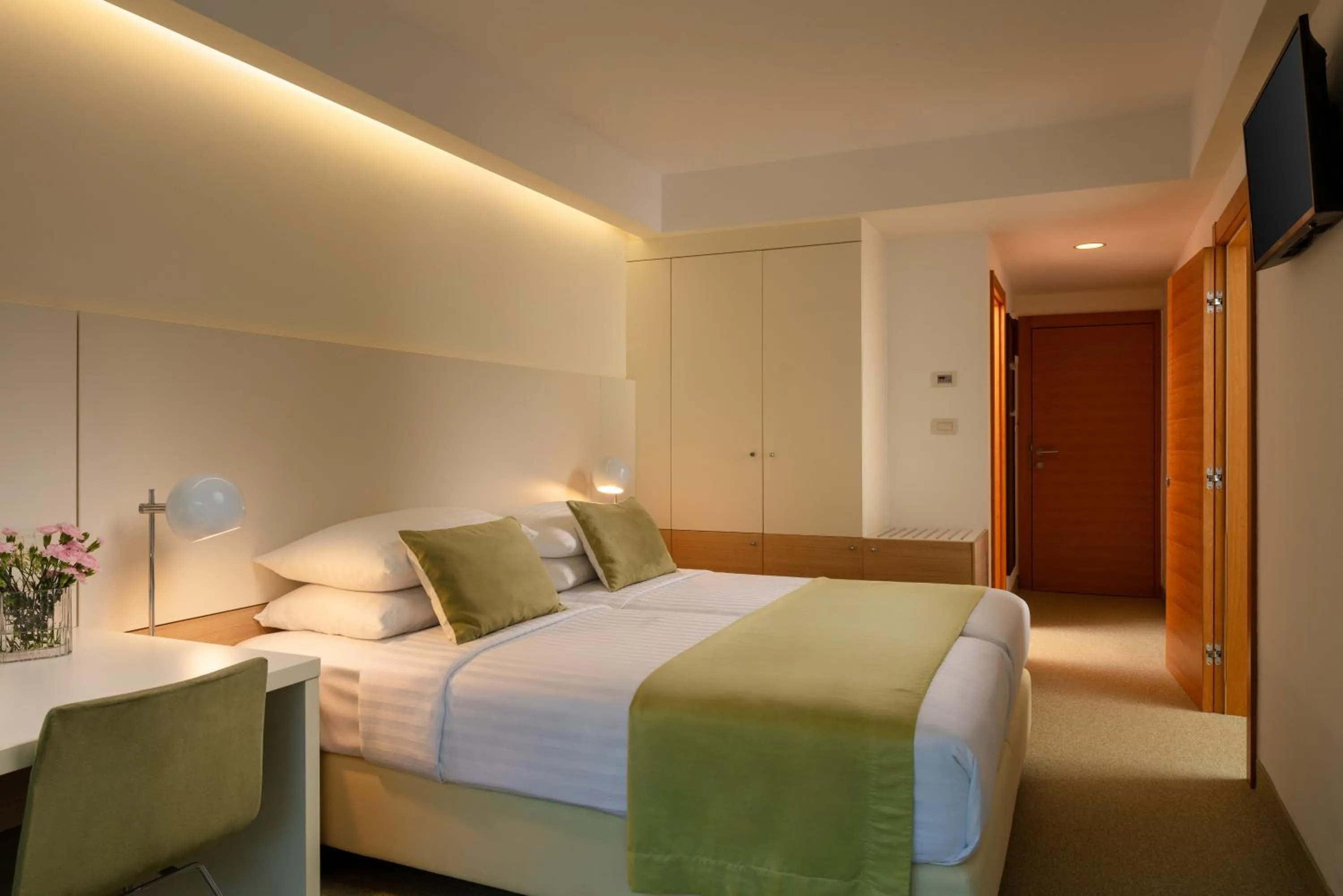 Bed in Family Hotel Vespera