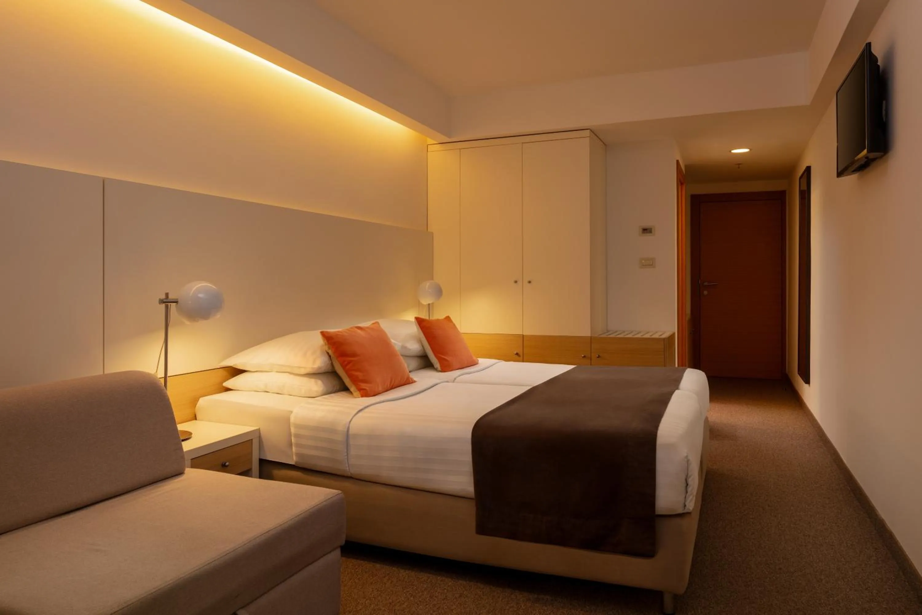 Bed in Family Hotel Vespera