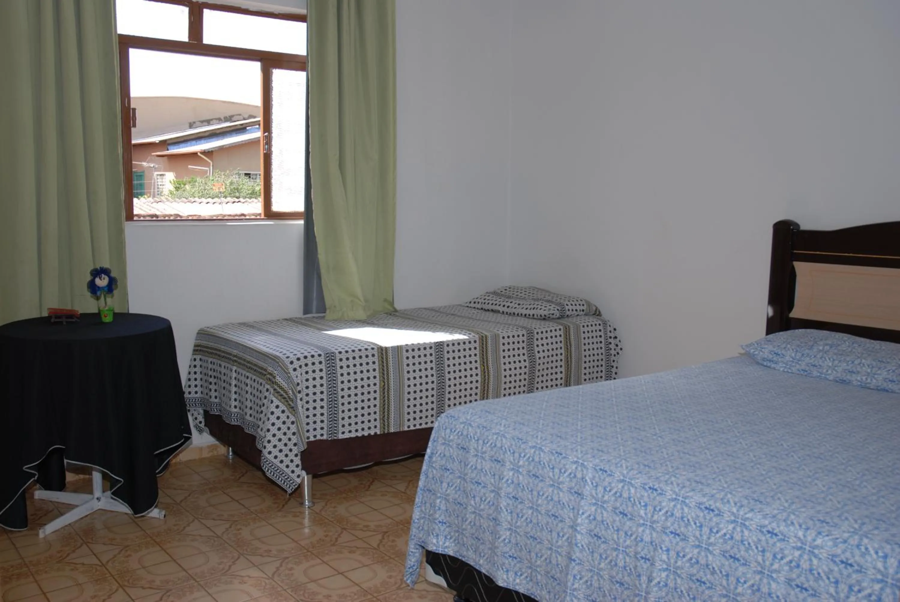 Bed in Pousada Ana Poipa