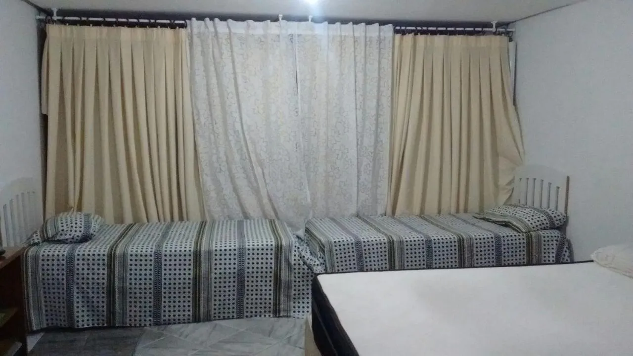 Bed in Pousada Ana Poipa