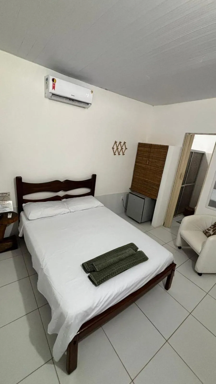 Bed in Pousada Estrela do Mar