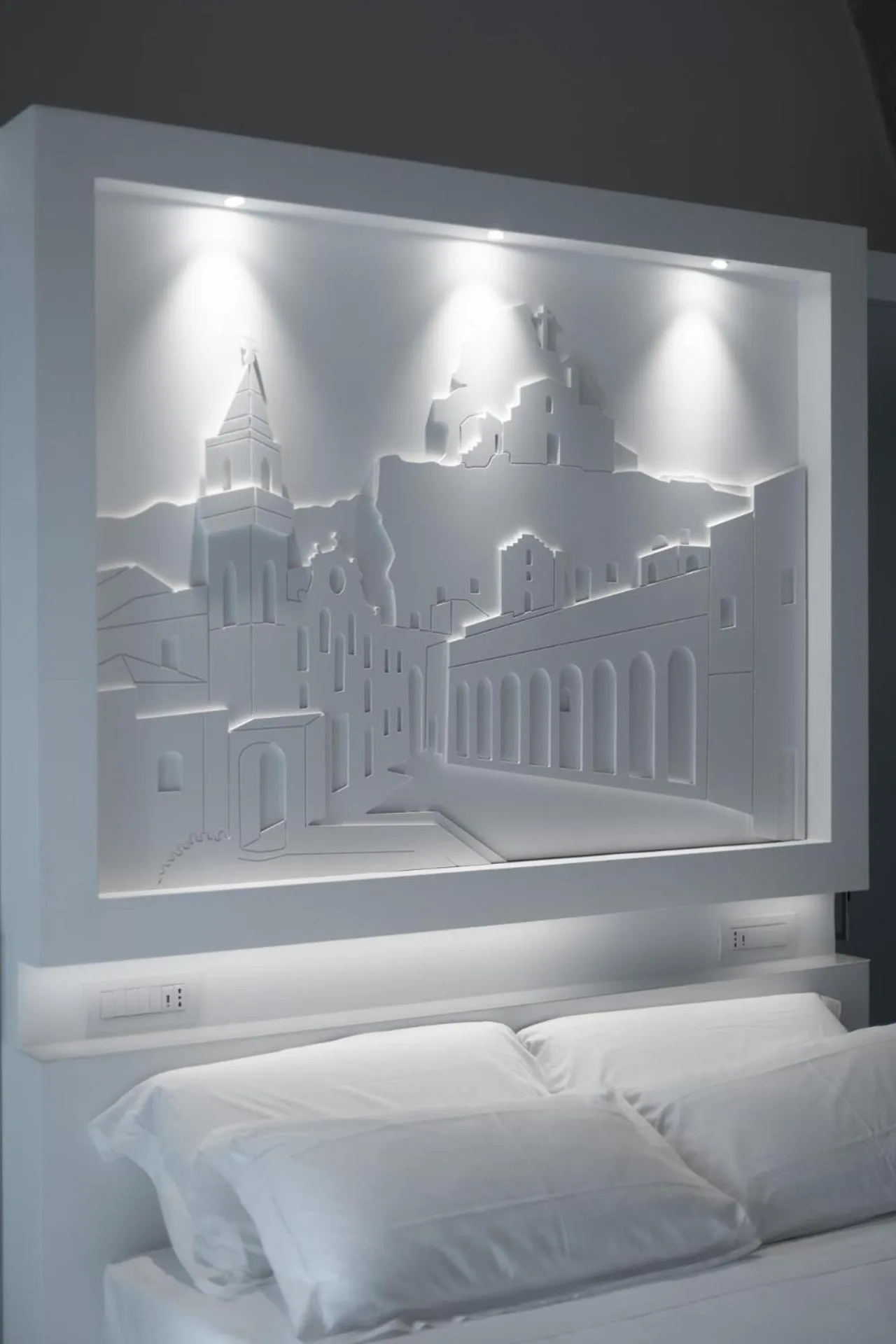 Bed in Vittorio Veneto Matera Luxury Rooms