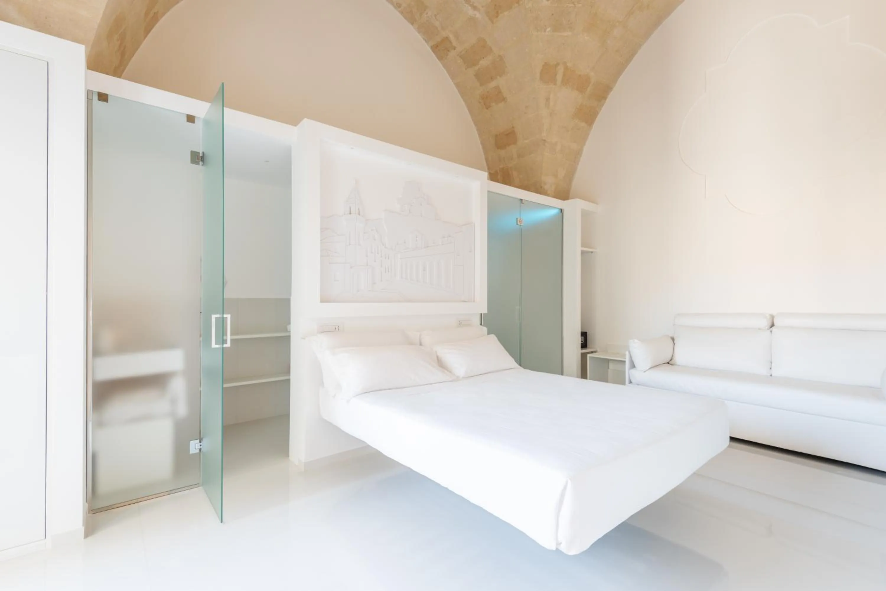 Bed in Vittorio Veneto Matera Luxury Rooms