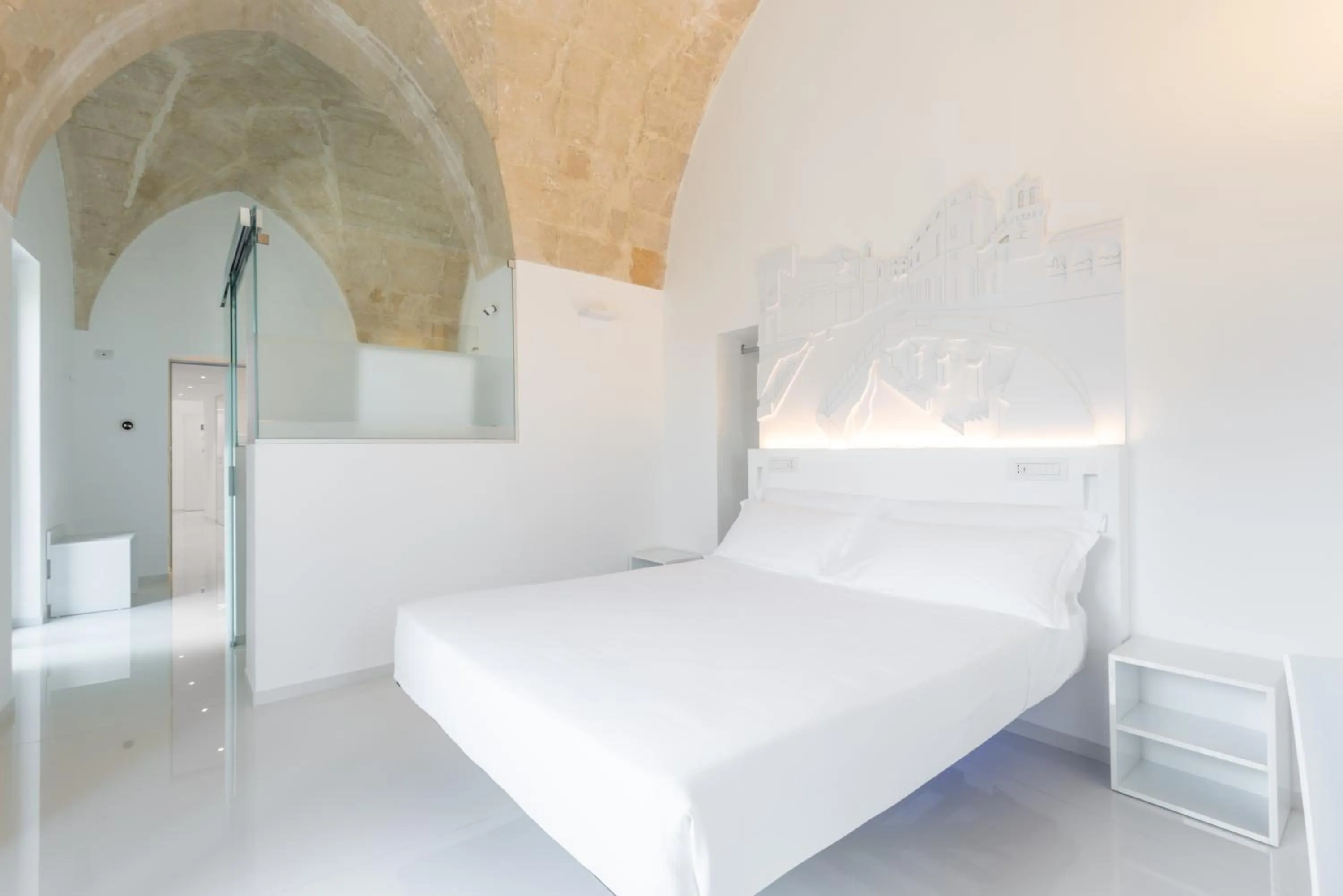 Bed in Vittorio Veneto Matera Luxury Rooms