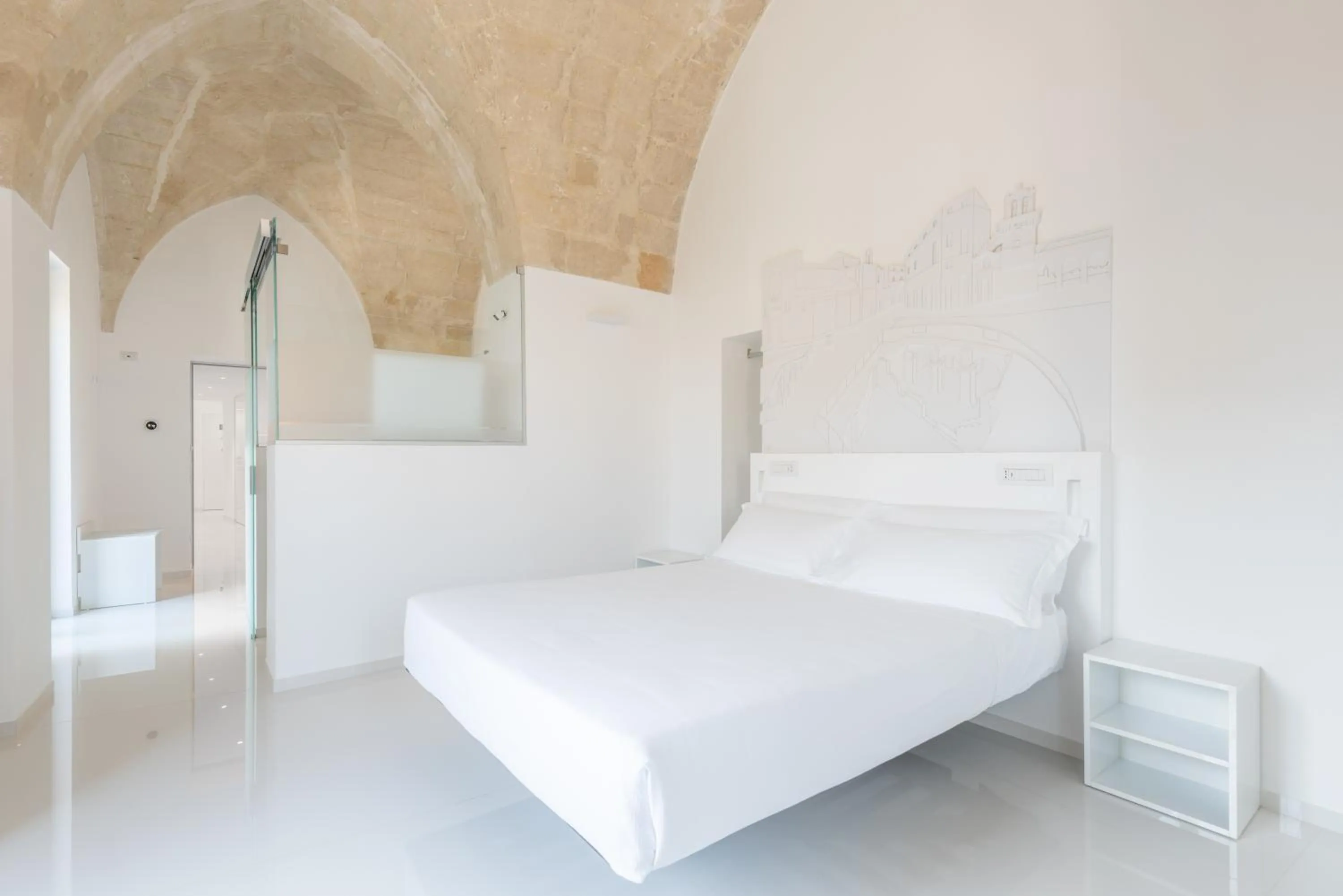 Bed in Vittorio Veneto Matera Luxury Rooms