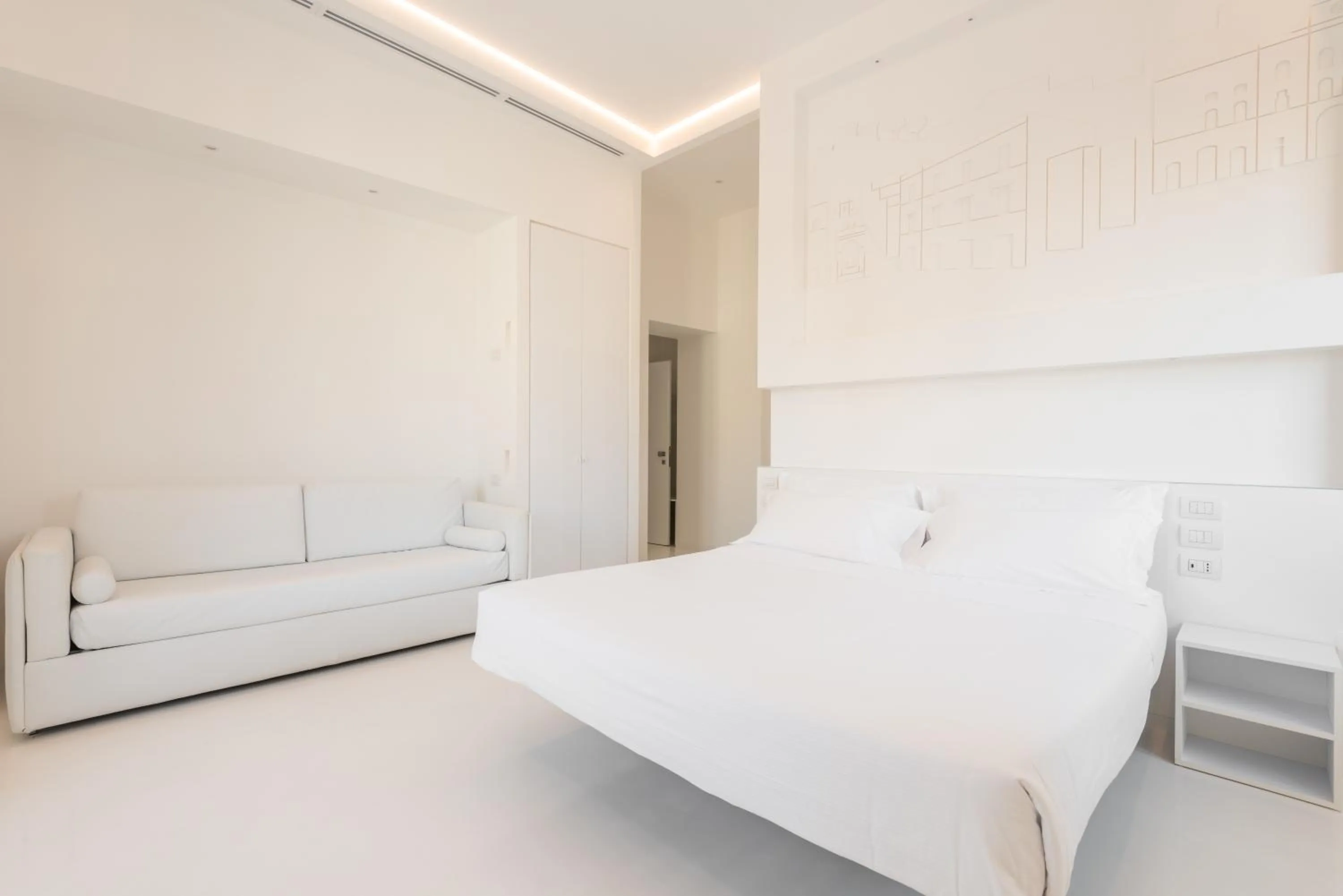 Bed in Vittorio Veneto Matera Luxury Rooms