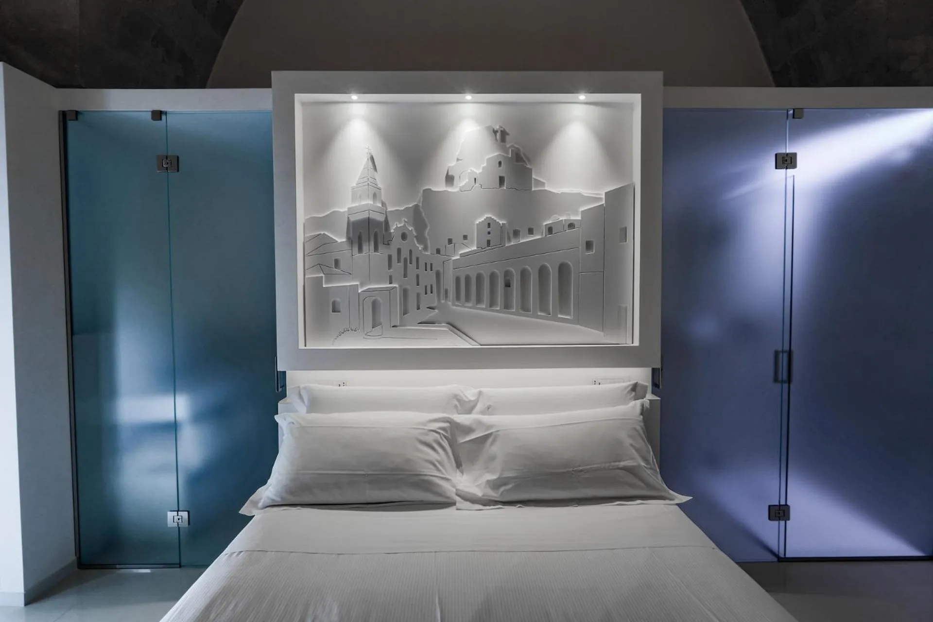 Bed in Vittorio Veneto Matera Luxury Rooms