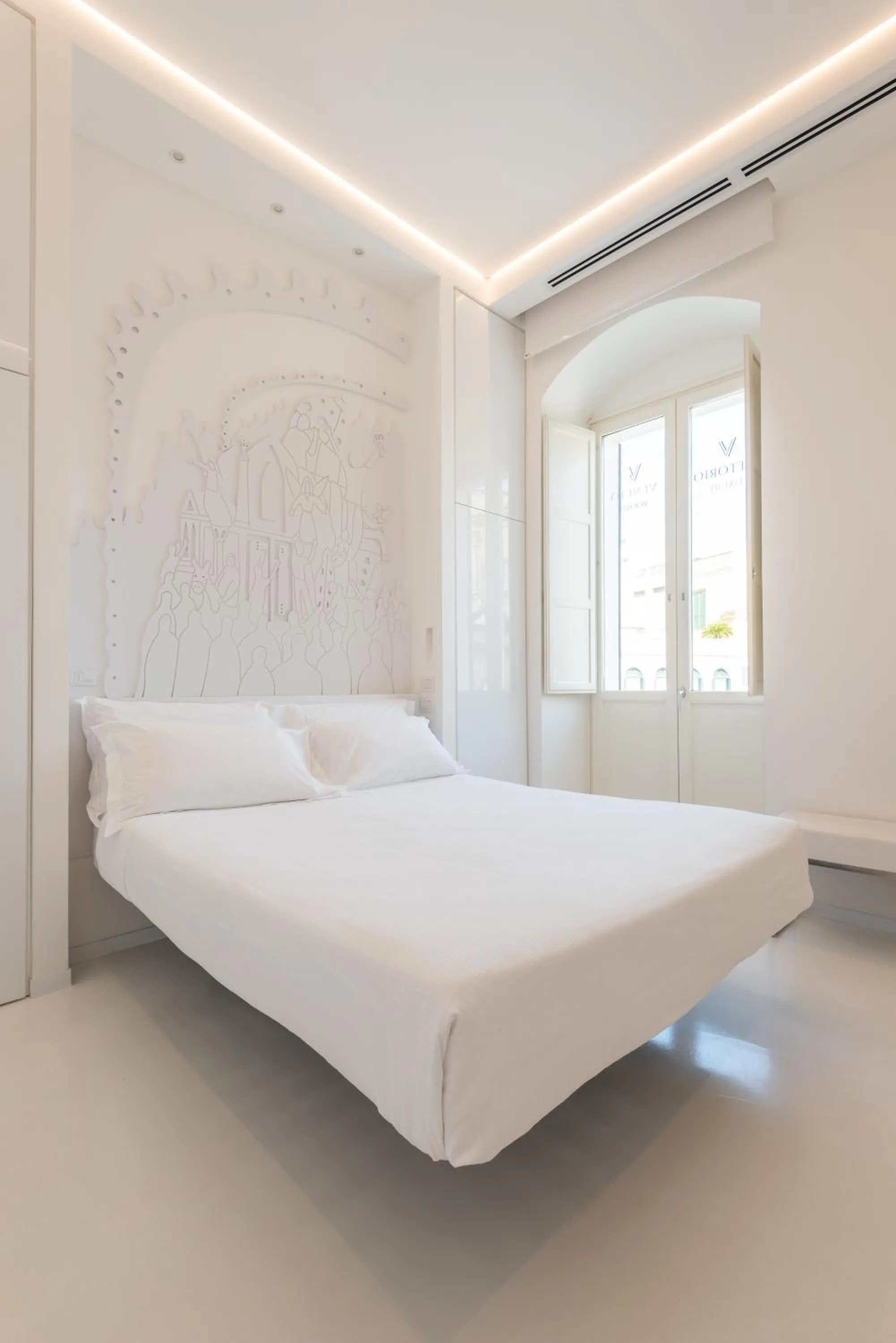 Bed in Vittorio Veneto Matera Luxury Rooms