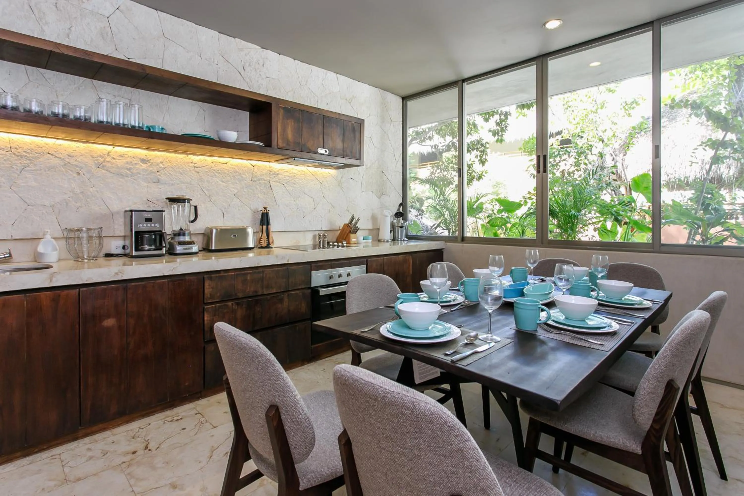 Kitchen or kitchenette in Eco-chic Design Condos Wrapped in Nature's Elements by Stella Rentals