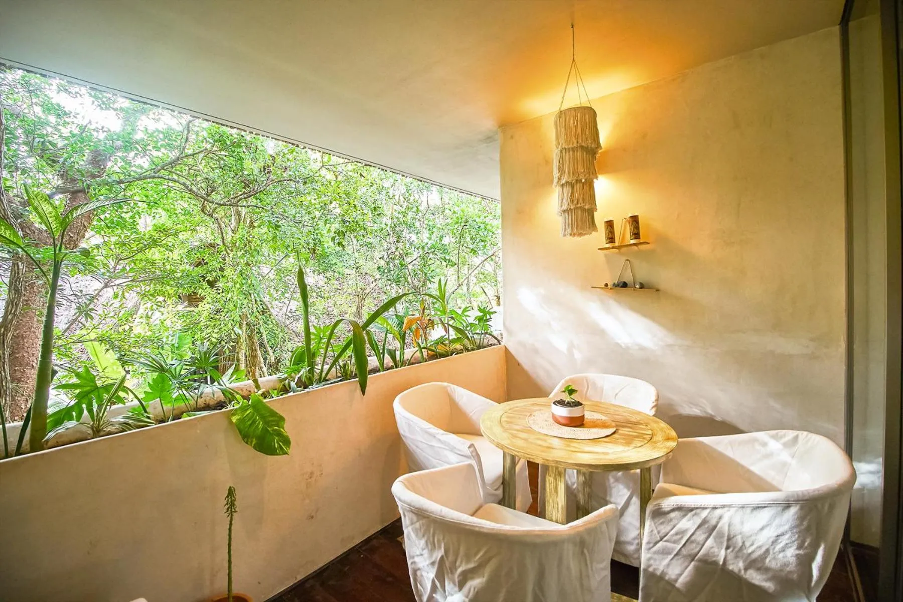 Balcony/Terrace in Eco-chic Design Condos Wrapped in Nature's Elements by Stella Rentals