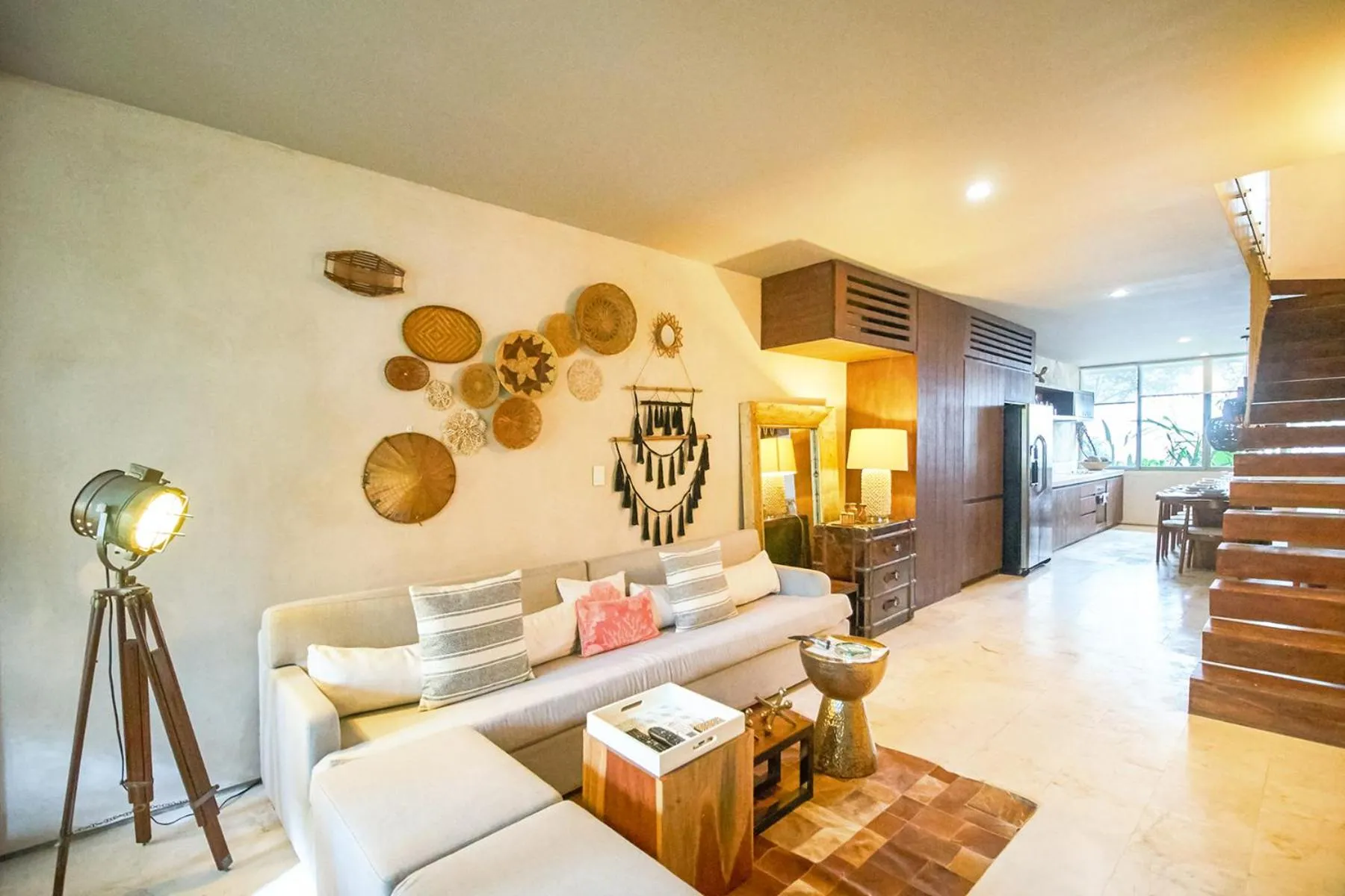 Living room in Eco-chic Design Condos Wrapped in Nature's Elements by Stella Rentals