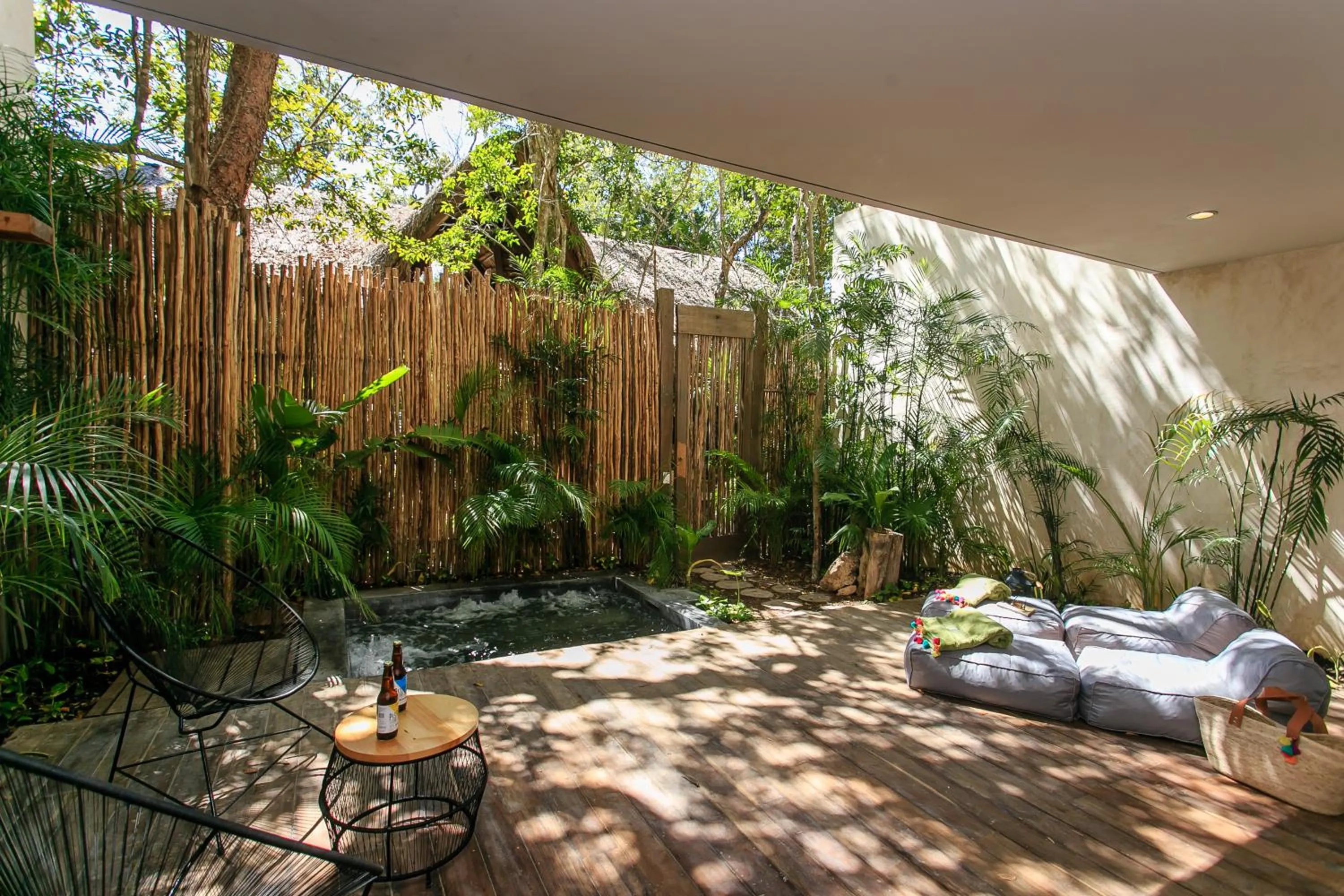 Balcony/Terrace in Eco-chic Design Condos Wrapped in Nature's Elements by Stella Rentals