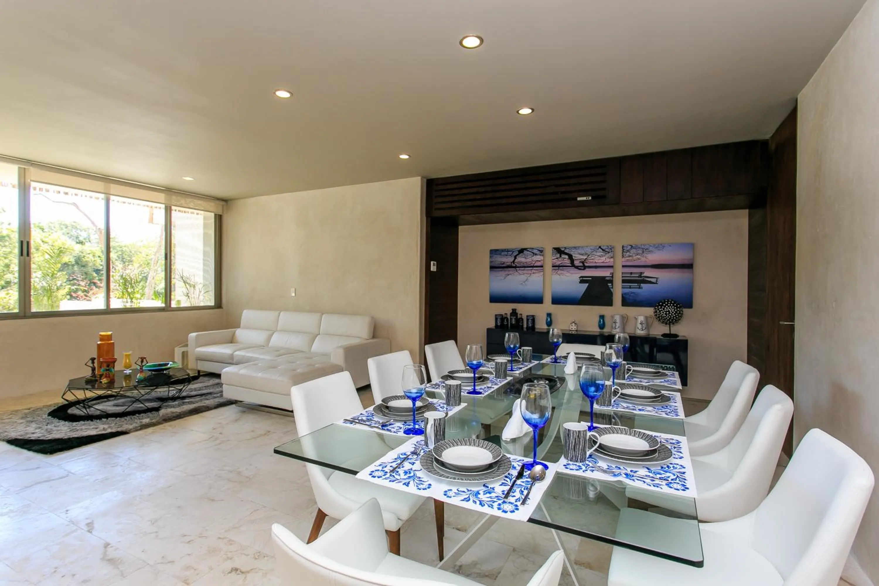 Dining area in Eco-chic Design Condos Wrapped in Nature's Elements by Stella Rentals