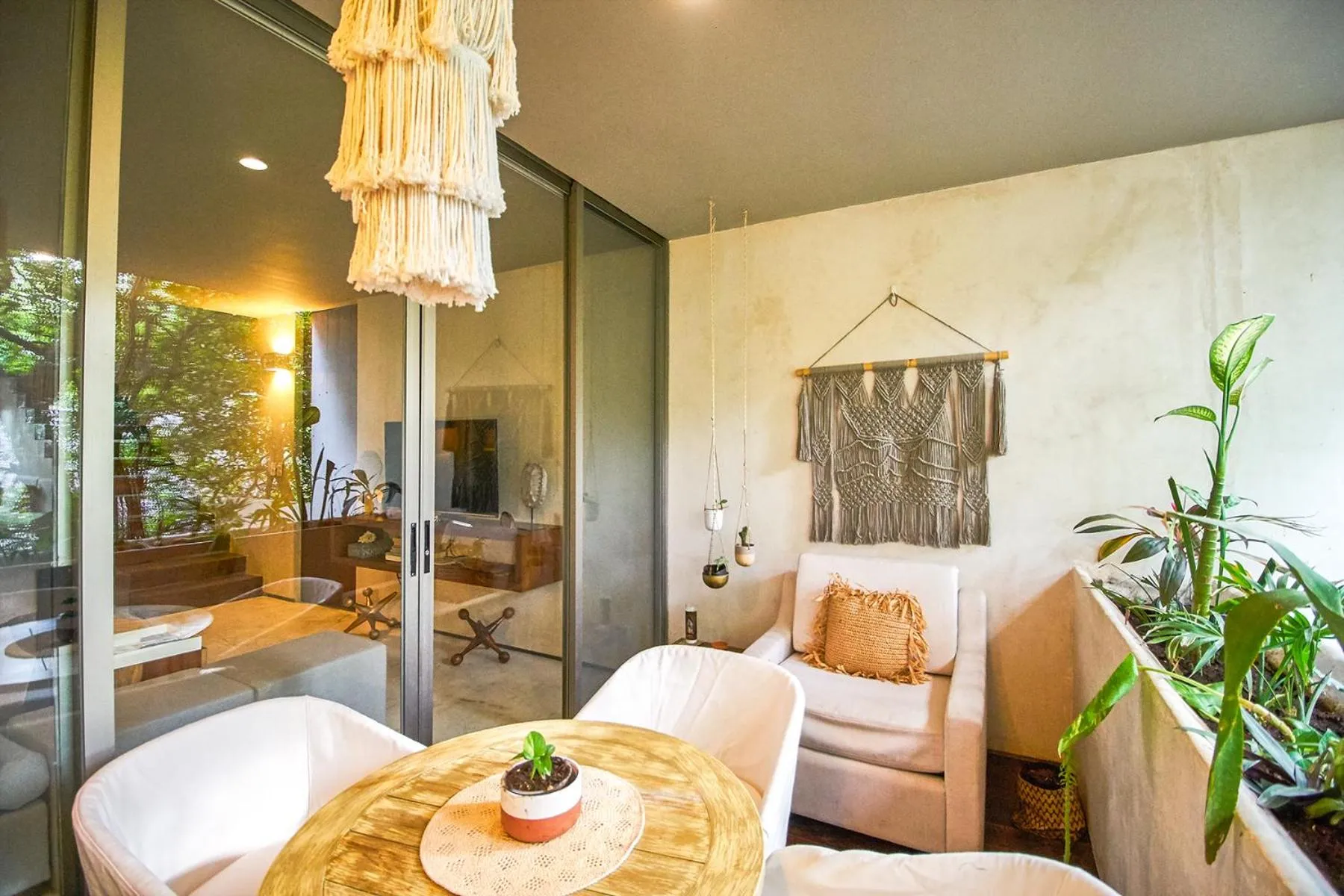 Balcony/Terrace in Eco-chic Design Condos Wrapped in Nature's Elements by Stella Rentals