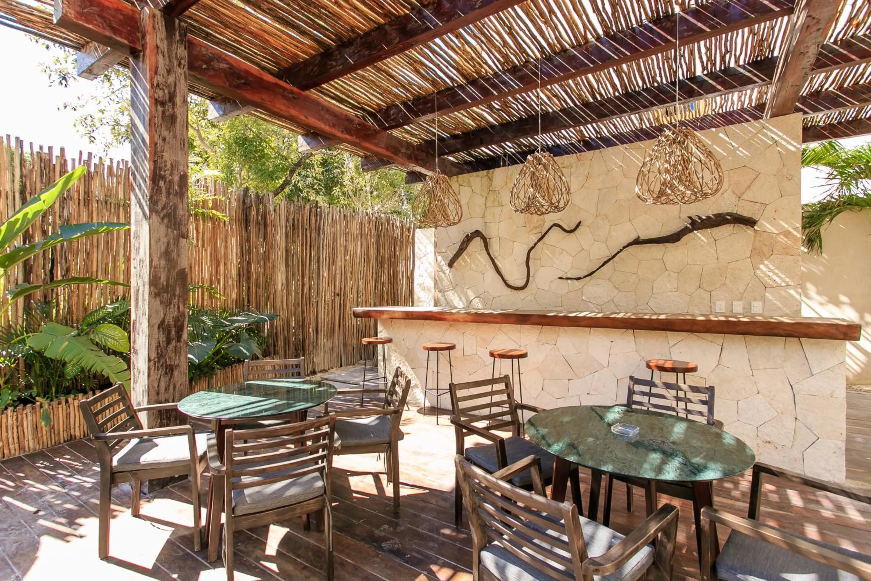 Lounge or bar in Eco-chic Design Condos Wrapped in Nature's Elements by Stella Rentals