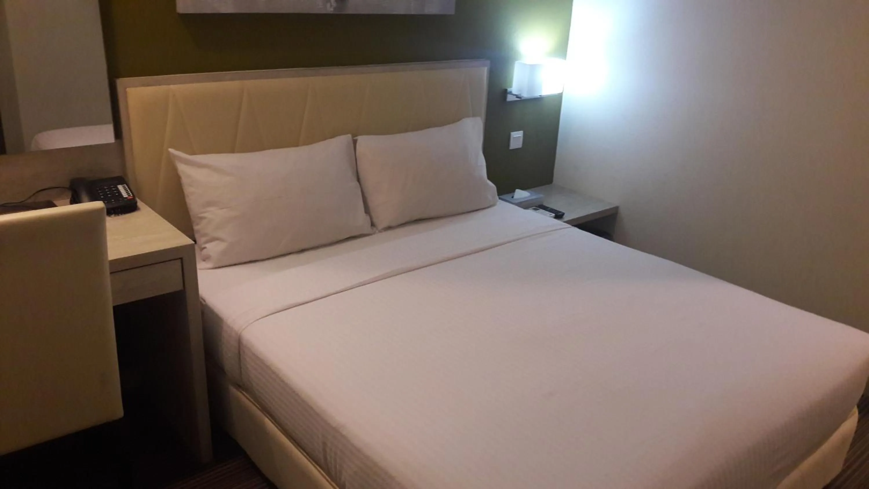Bed in Kosma Business Hotel