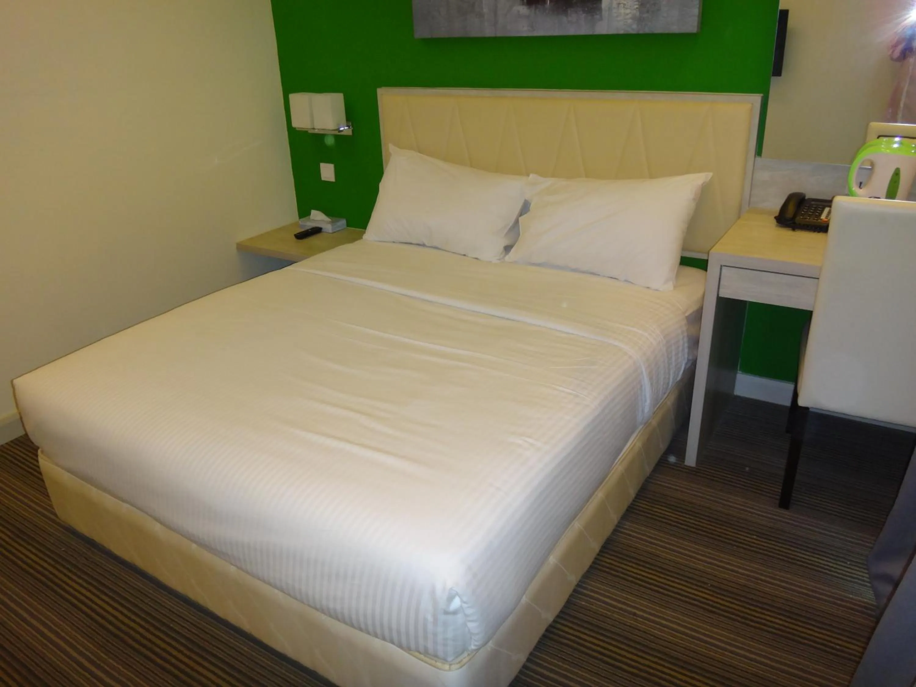 Bed in Kosma Business Hotel