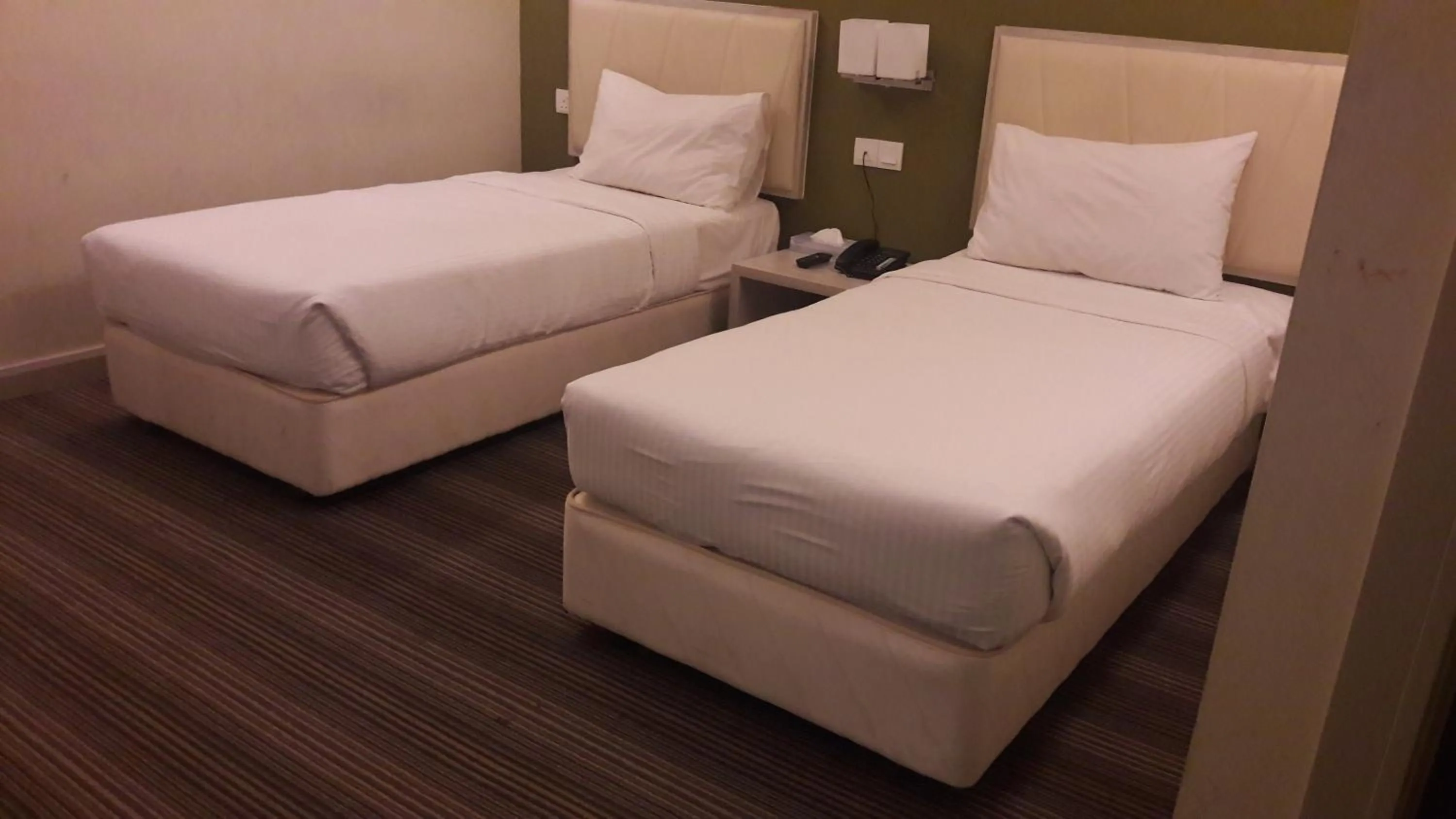 Bed in Kosma Business Hotel