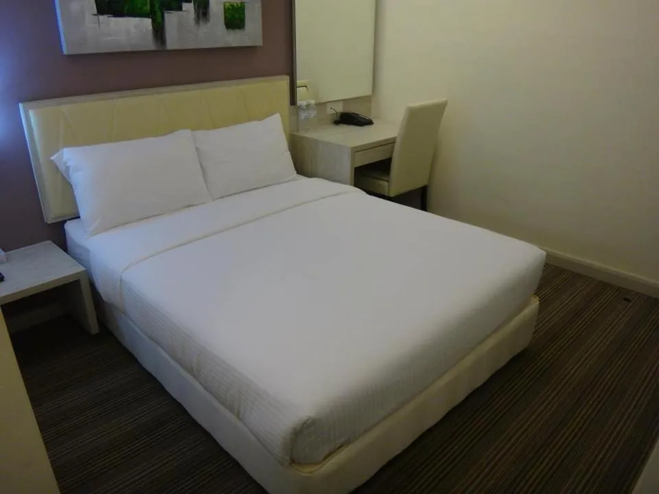 Bed in Kosma Business Hotel