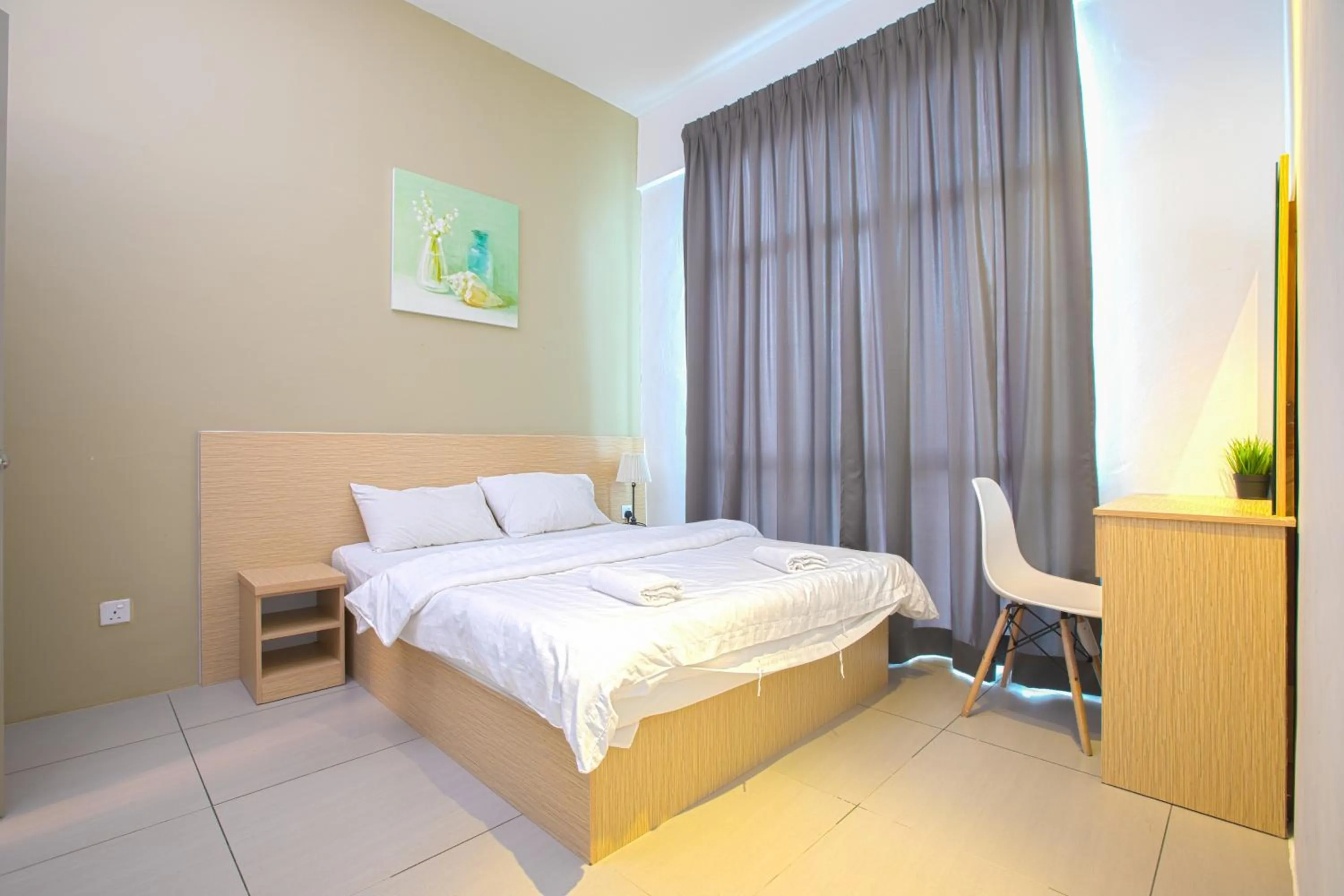 Bed in DreamScape Apartment @ Golden Hill