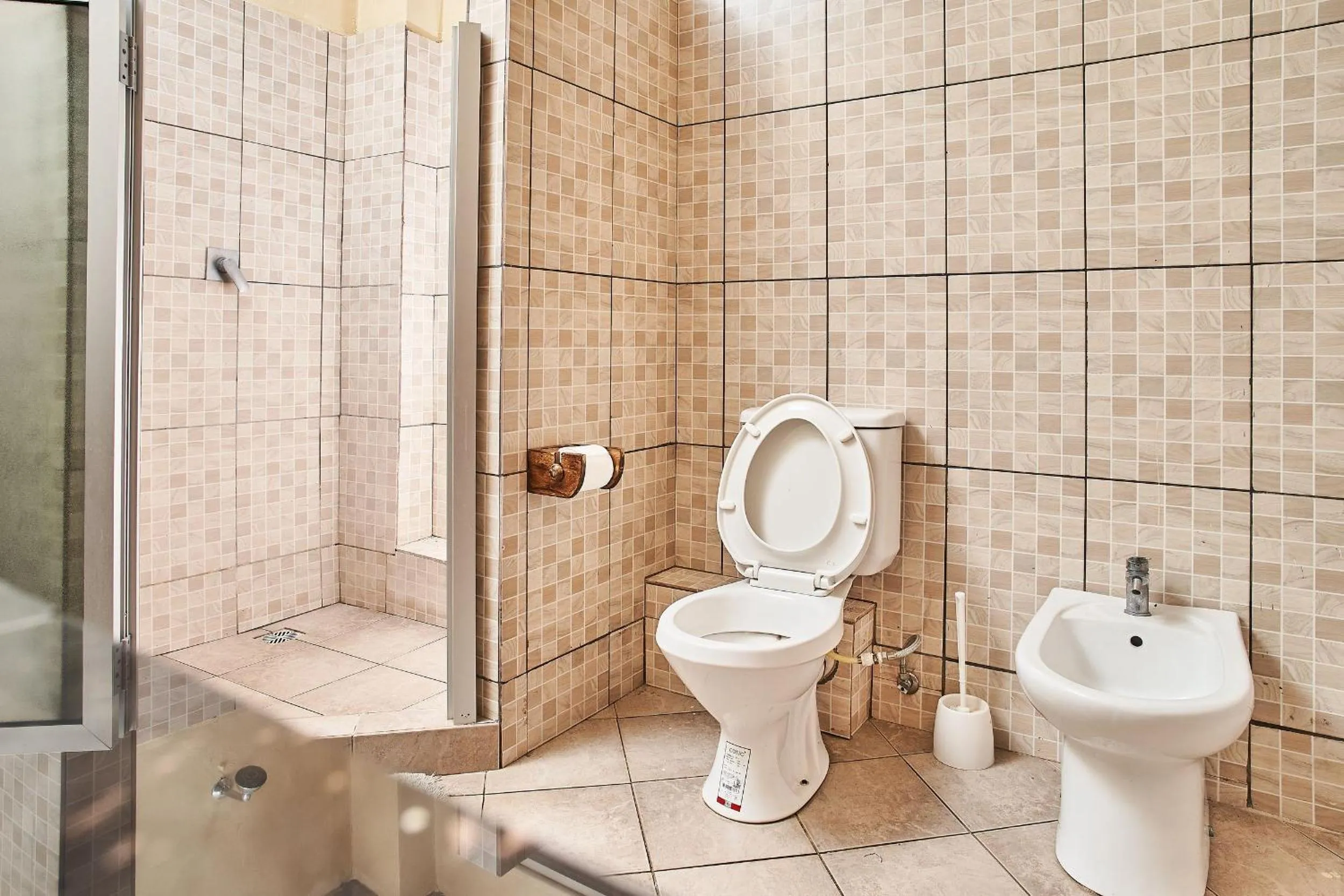 Toilet in Coral Beach Resort