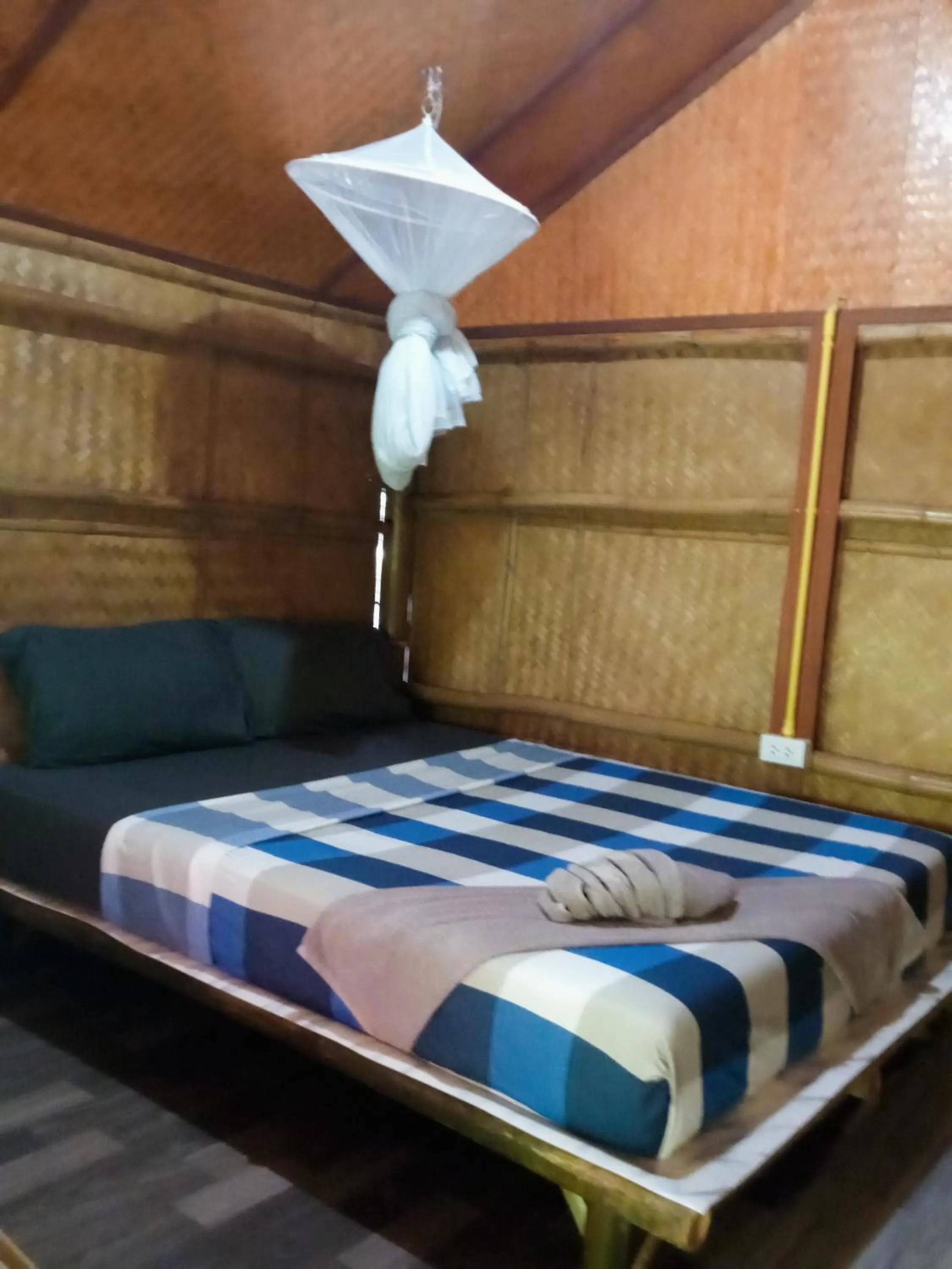 Bed in New Andaman Bay Bungalow