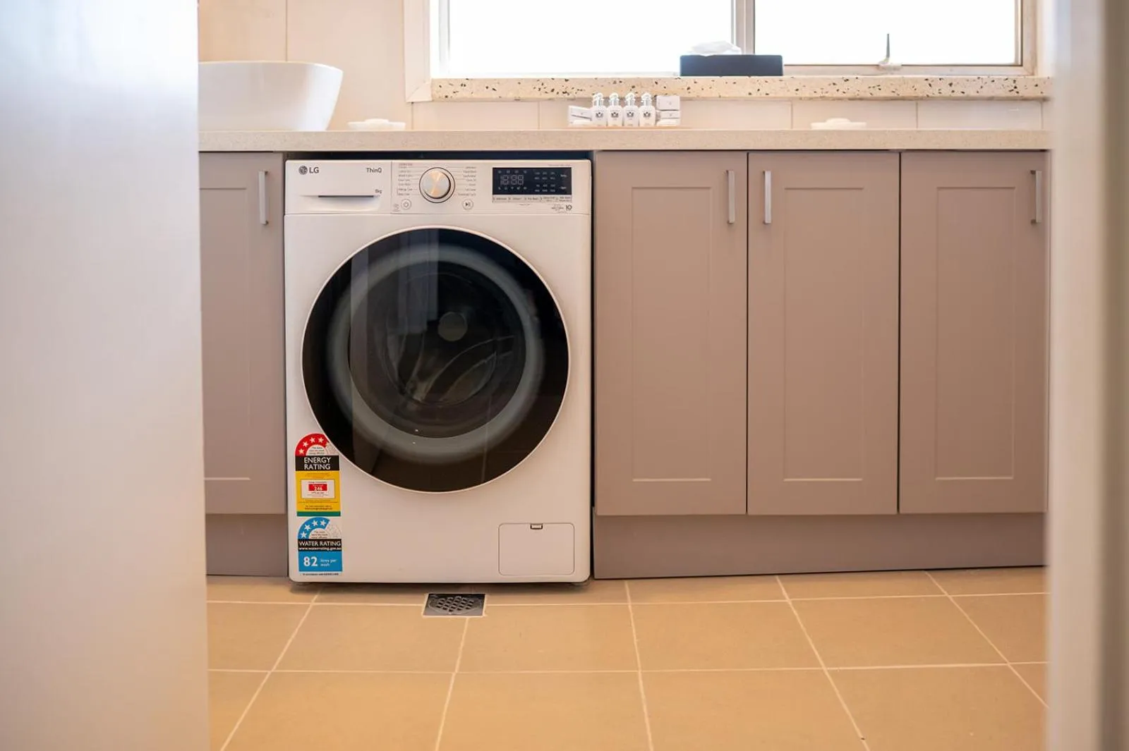 washing machine in Loxton Courthouse Apartments