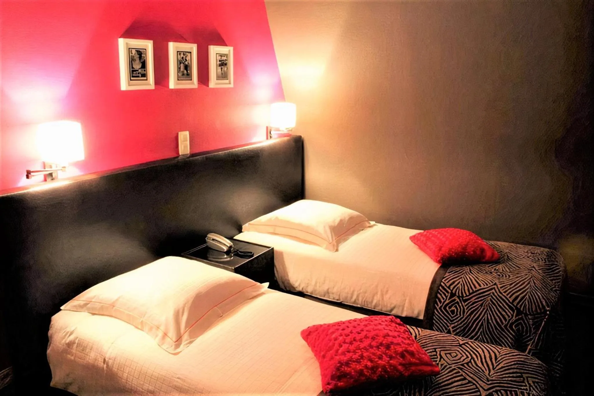 Bed in Hotel L'Esprit Sain