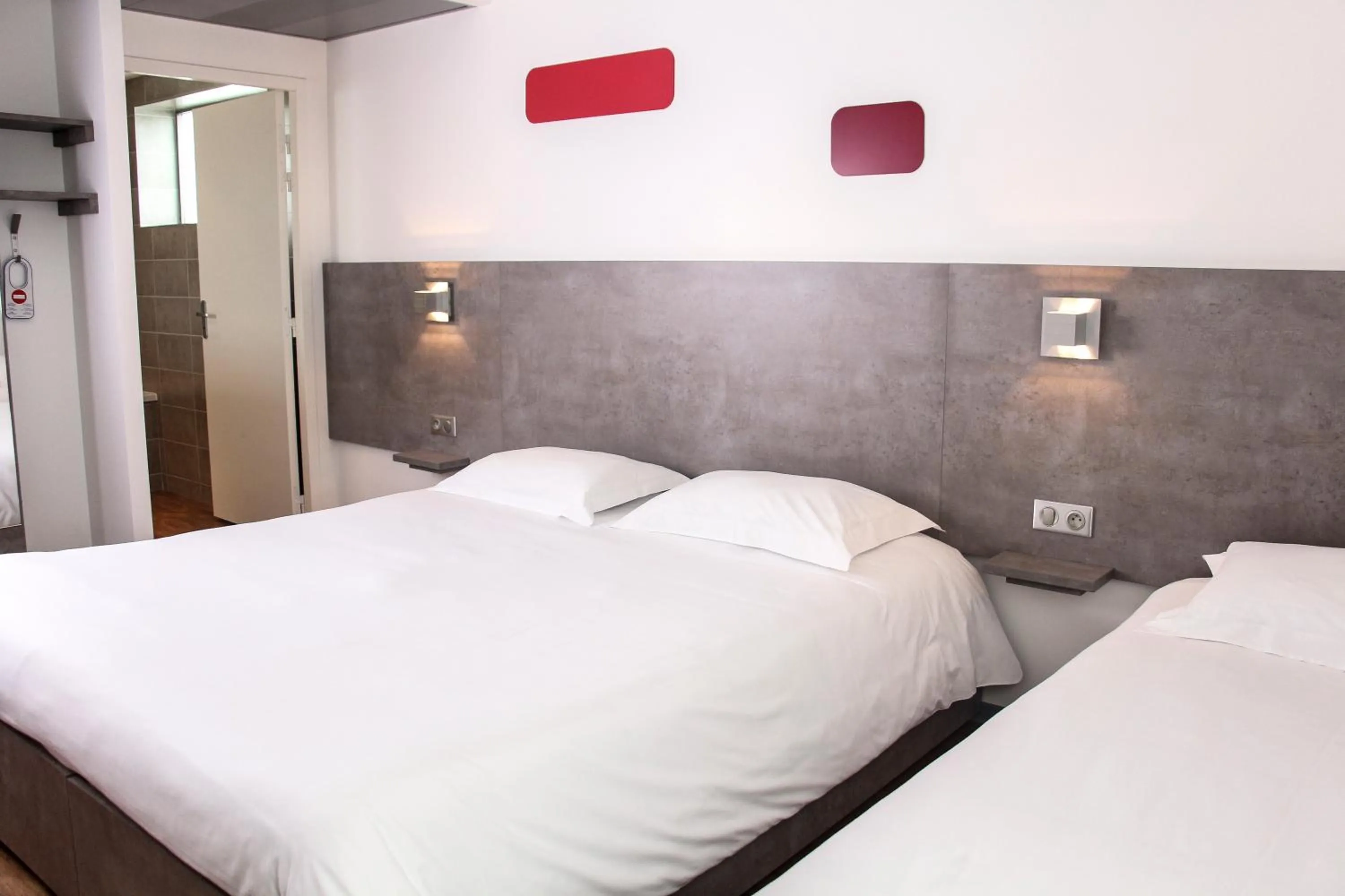 Bed in H24 HOTEL