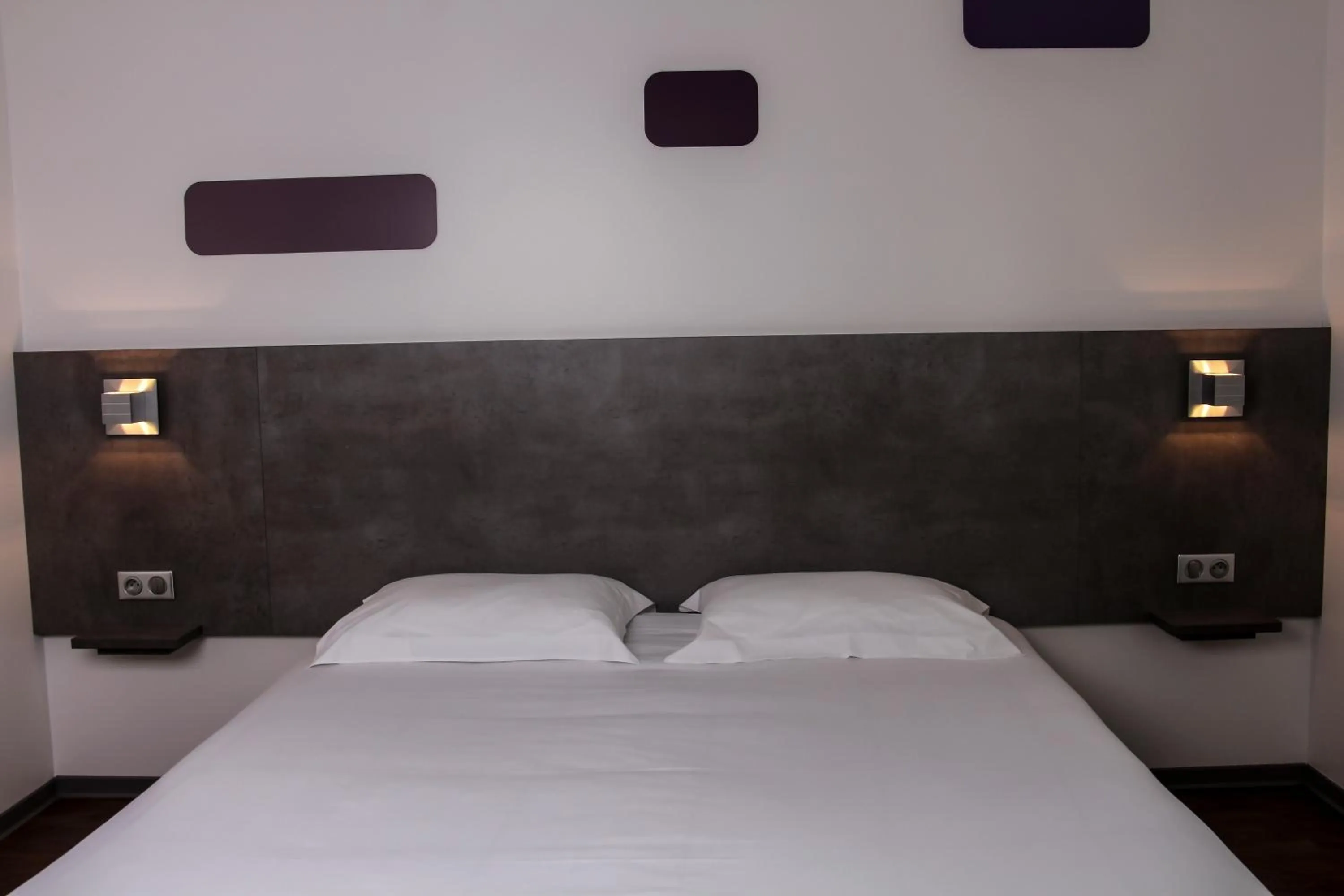 Bed in H24 HOTEL