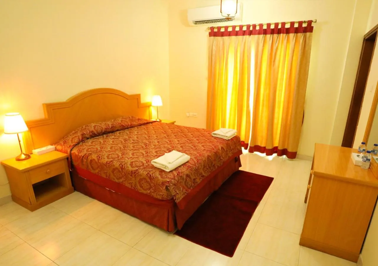 Bed in ltlalat Al Shorouq Hotel