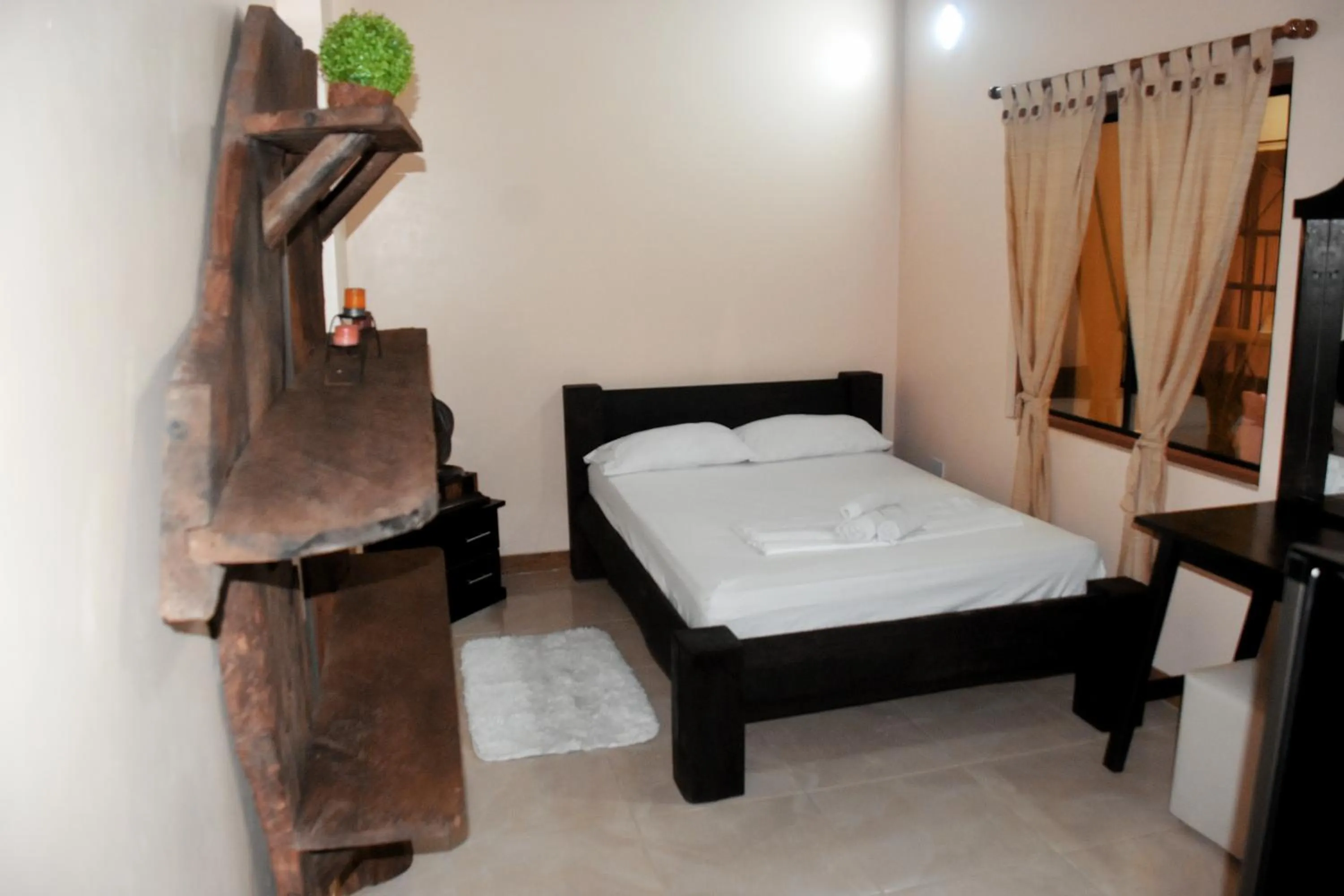 Bed in ApartaHotel Tierras Amazonicas