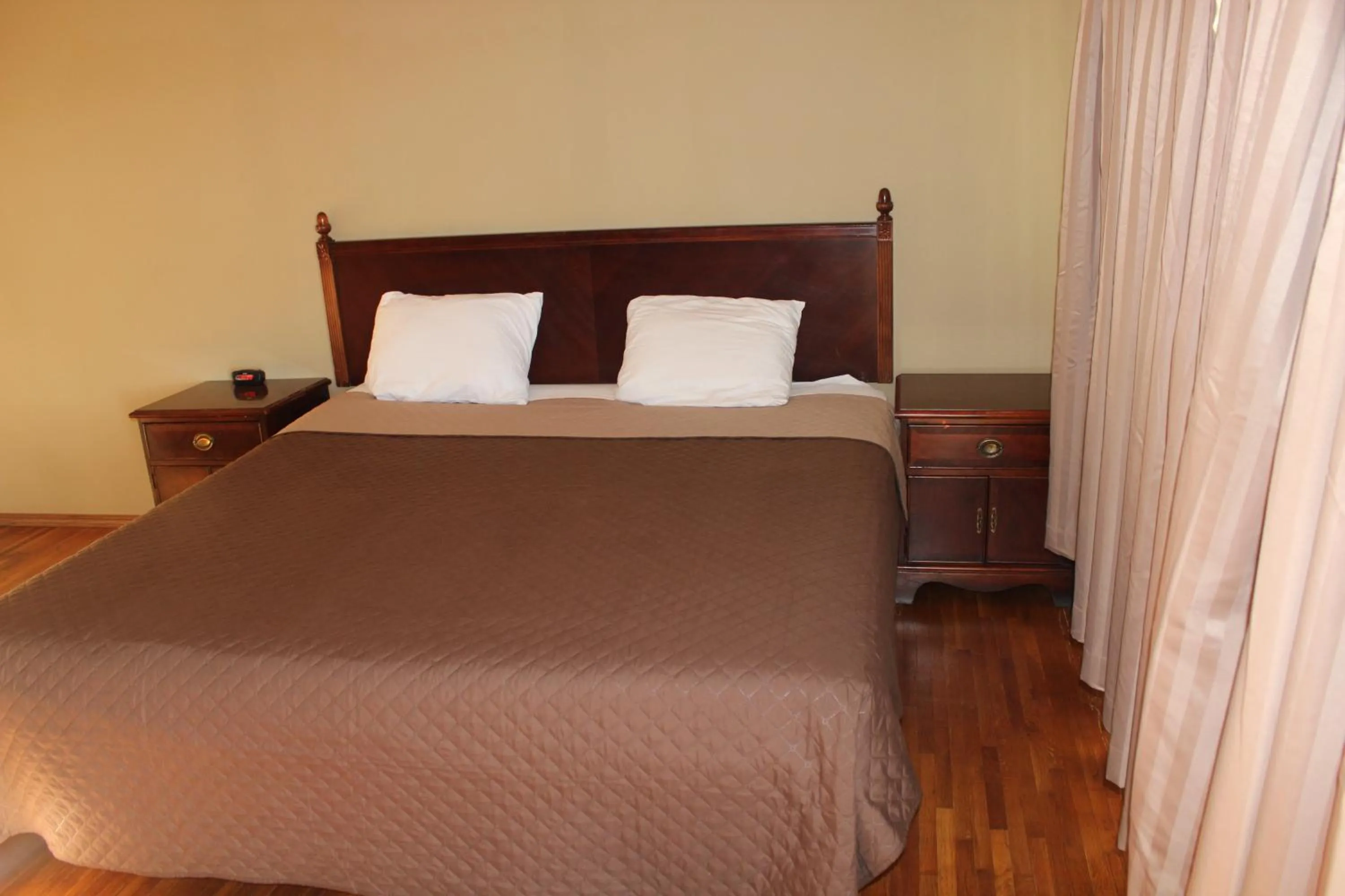 Bed in Eastwood Inn of Wadena