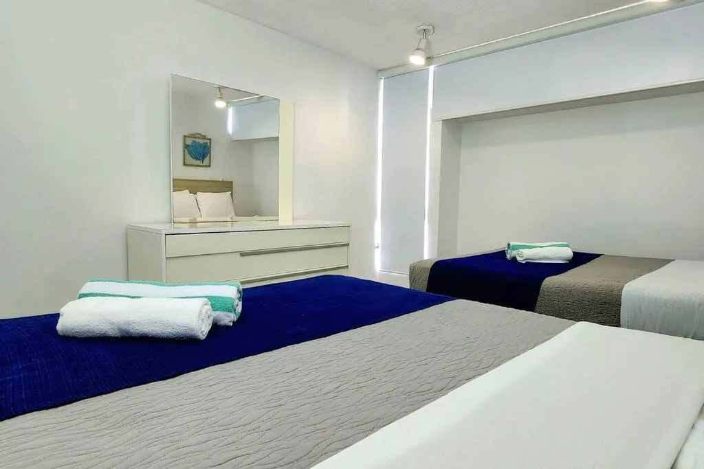 Photo of the whole room, Bed in OCEAN VIEW DELUXE SUITE: PVT. BEACH & POOL