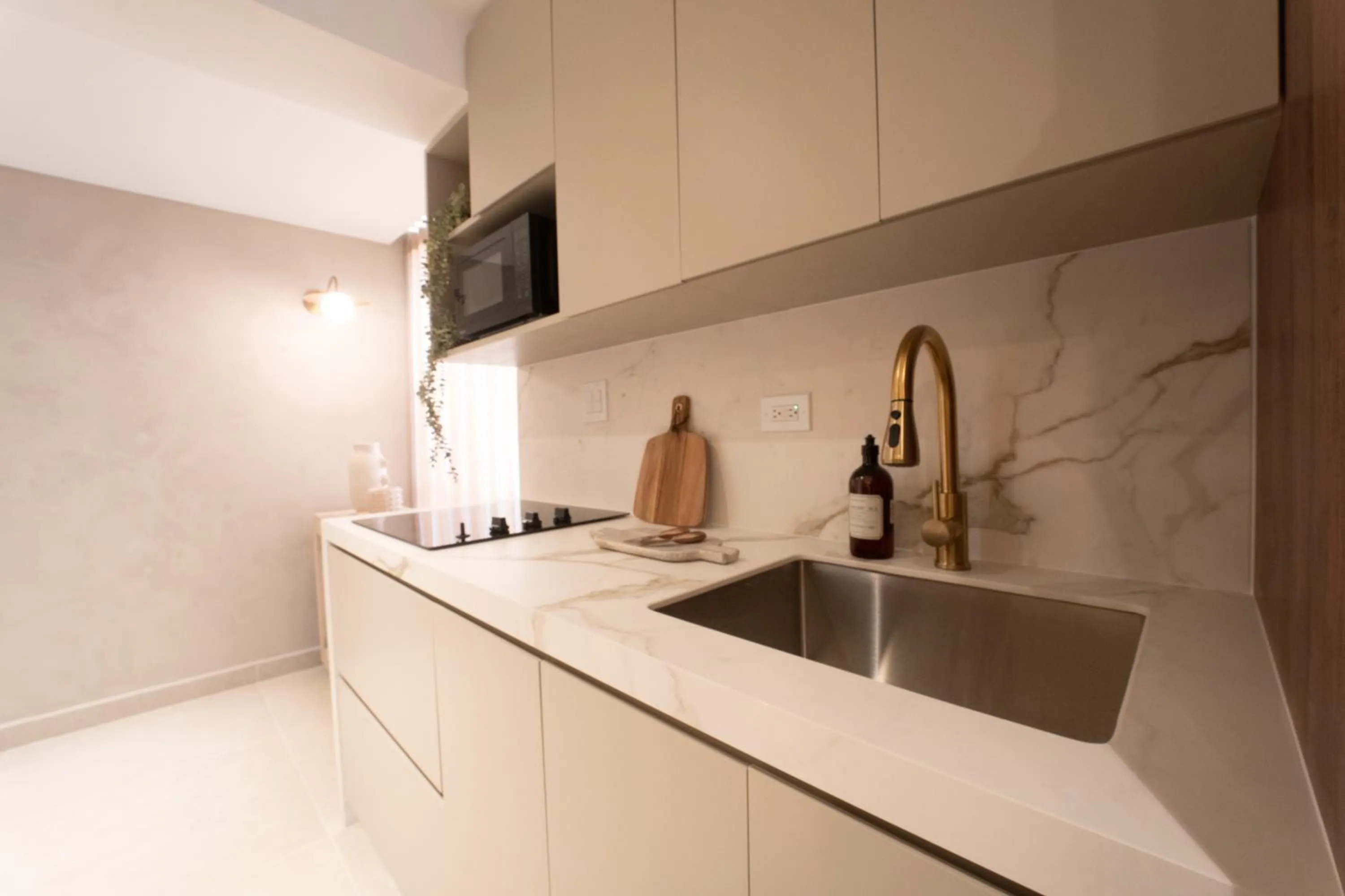 kitchen in OCEAN VIEW DELUXE SUITE: PVT. BEACH & POOL