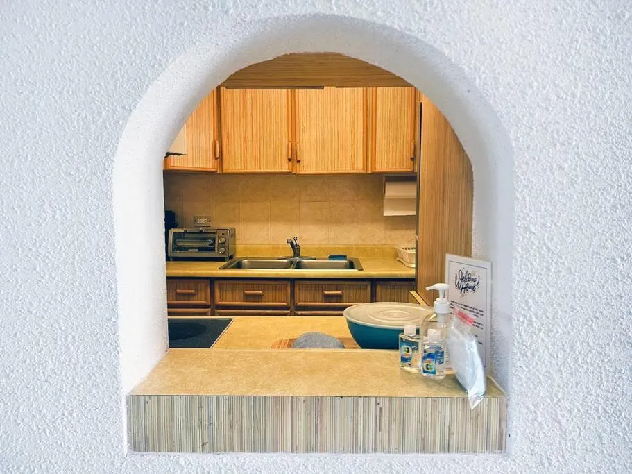 Kitchen or kitchenette in OCEAN VIEW DELUXE SUITE: PVT. BEACH & POOL