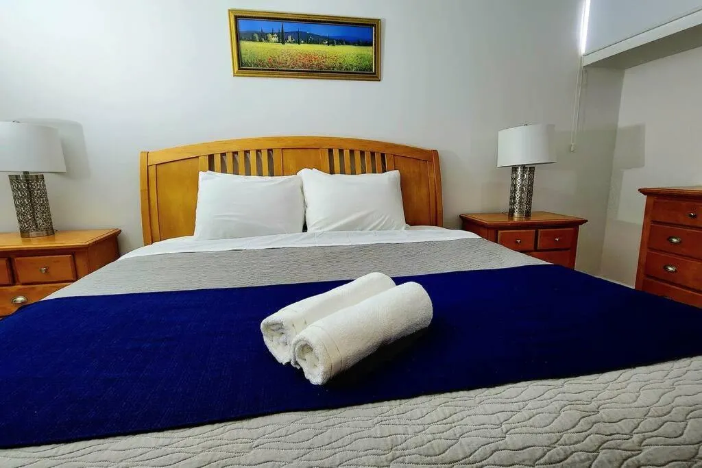Photo of the whole room, Bed in OCEAN VIEW DELUXE SUITE: PVT. BEACH & POOL