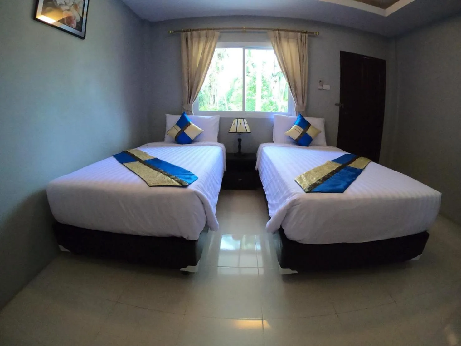 Bed in Bussarin Mansion Koh Yao Yai