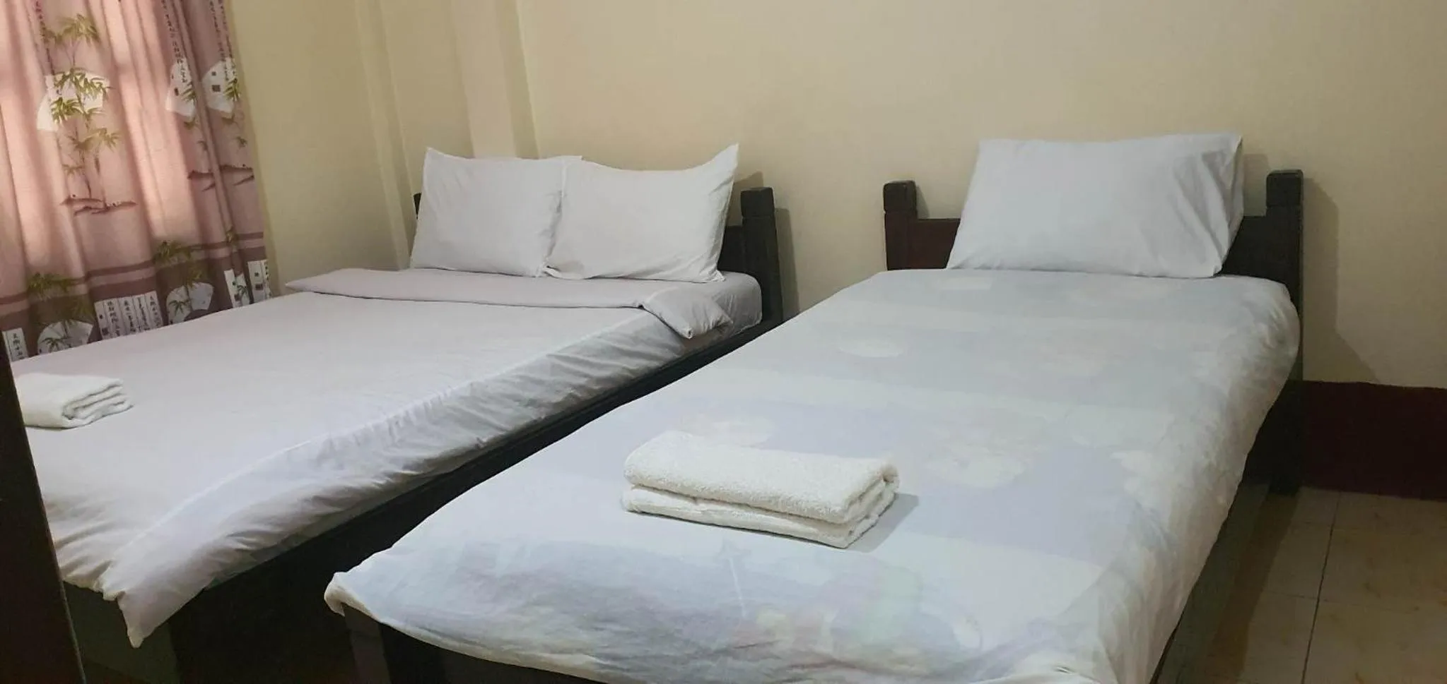Bed in Pakbeng Guesthouse
